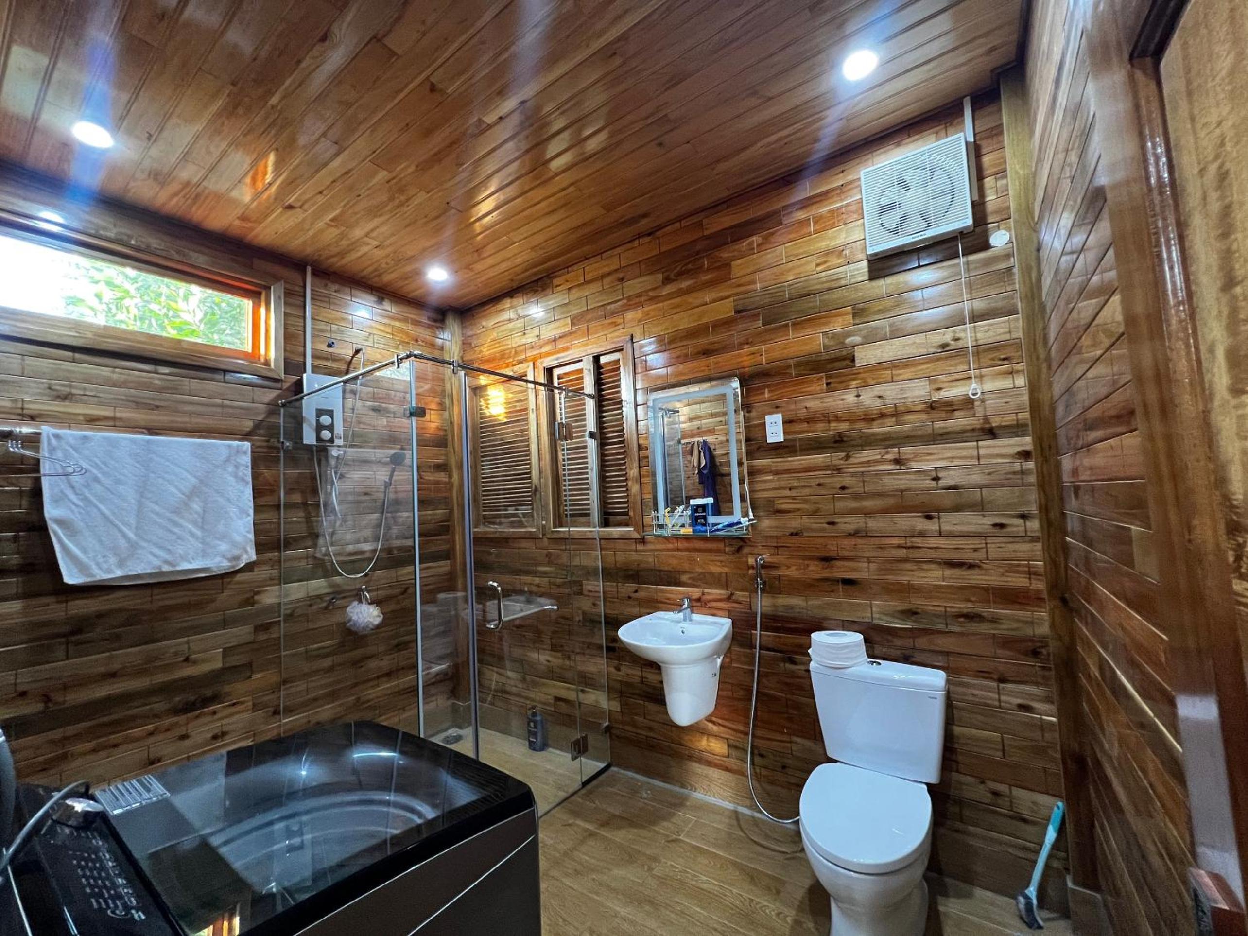 The wooden house has a beautiful sunrise & seaview view 5
