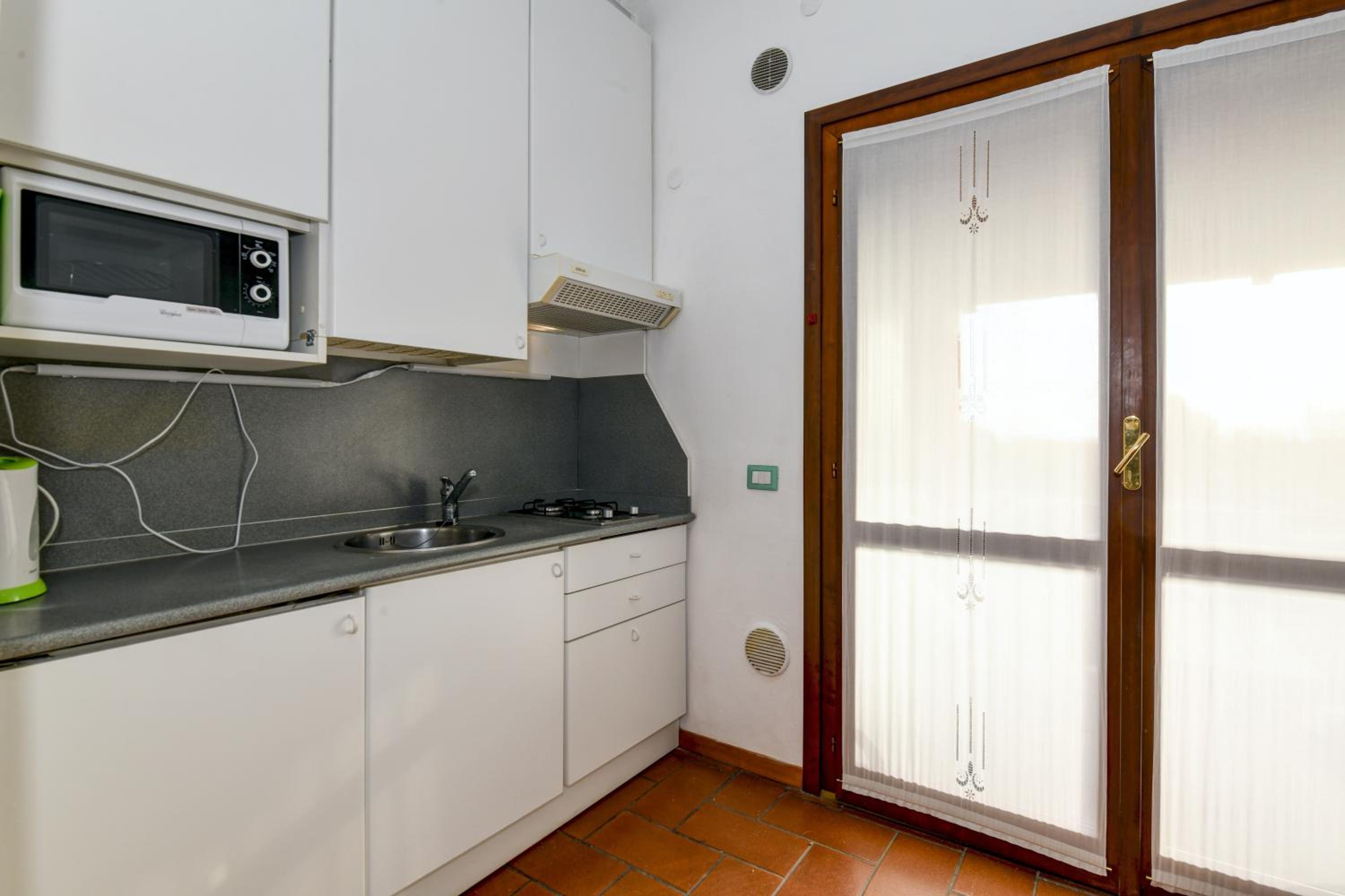 HOST4U - GARDA GOLF RESIDENCE APARTMENT with Pool and Private Parking view 3