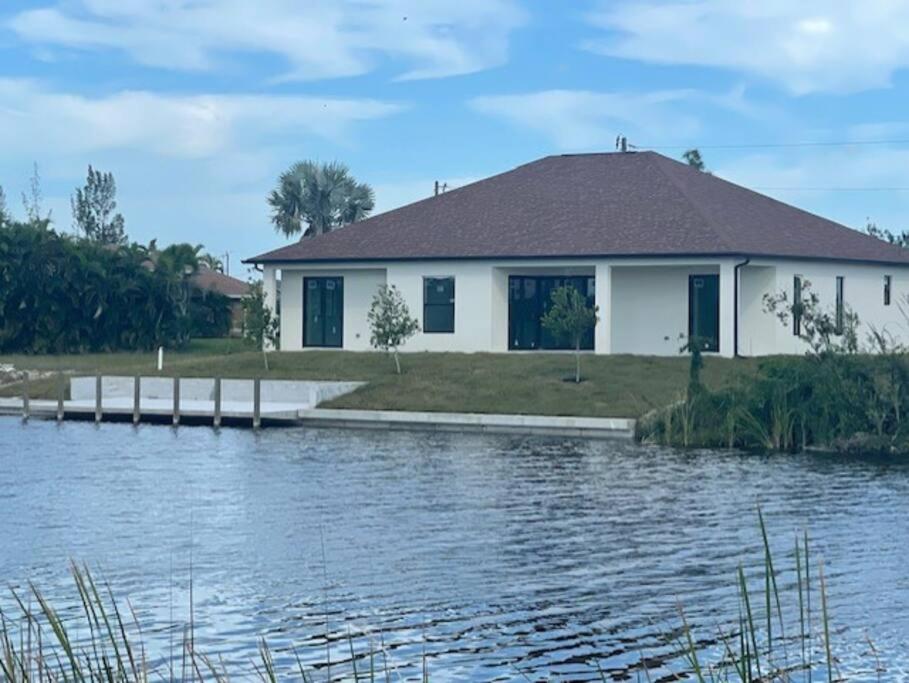 New 4 bed house on a canal facing south & door ramp, near golf course and softball