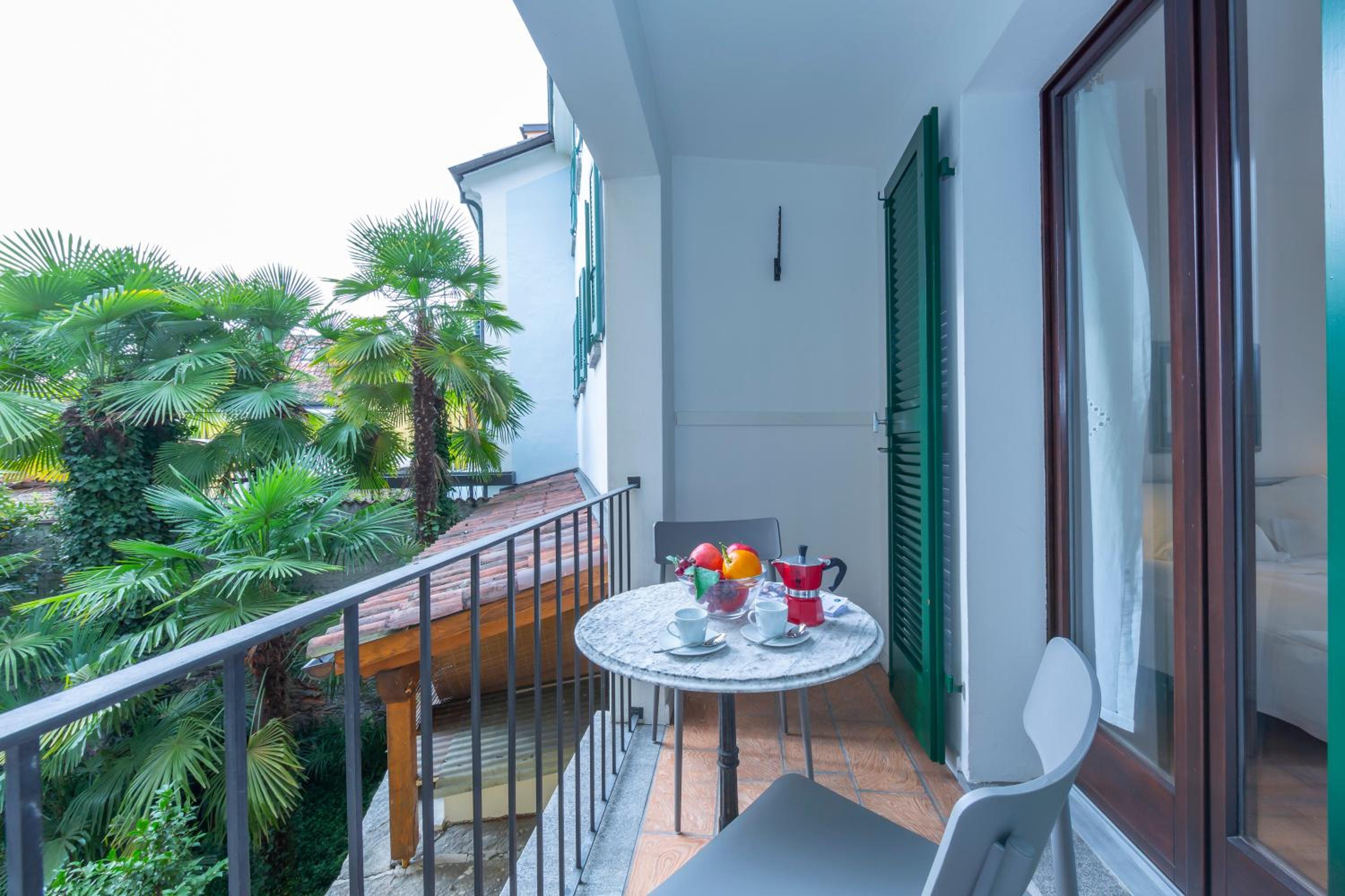 Casa Chiara Muralto with Balcony & Wi‑Fi - Happy Rentals