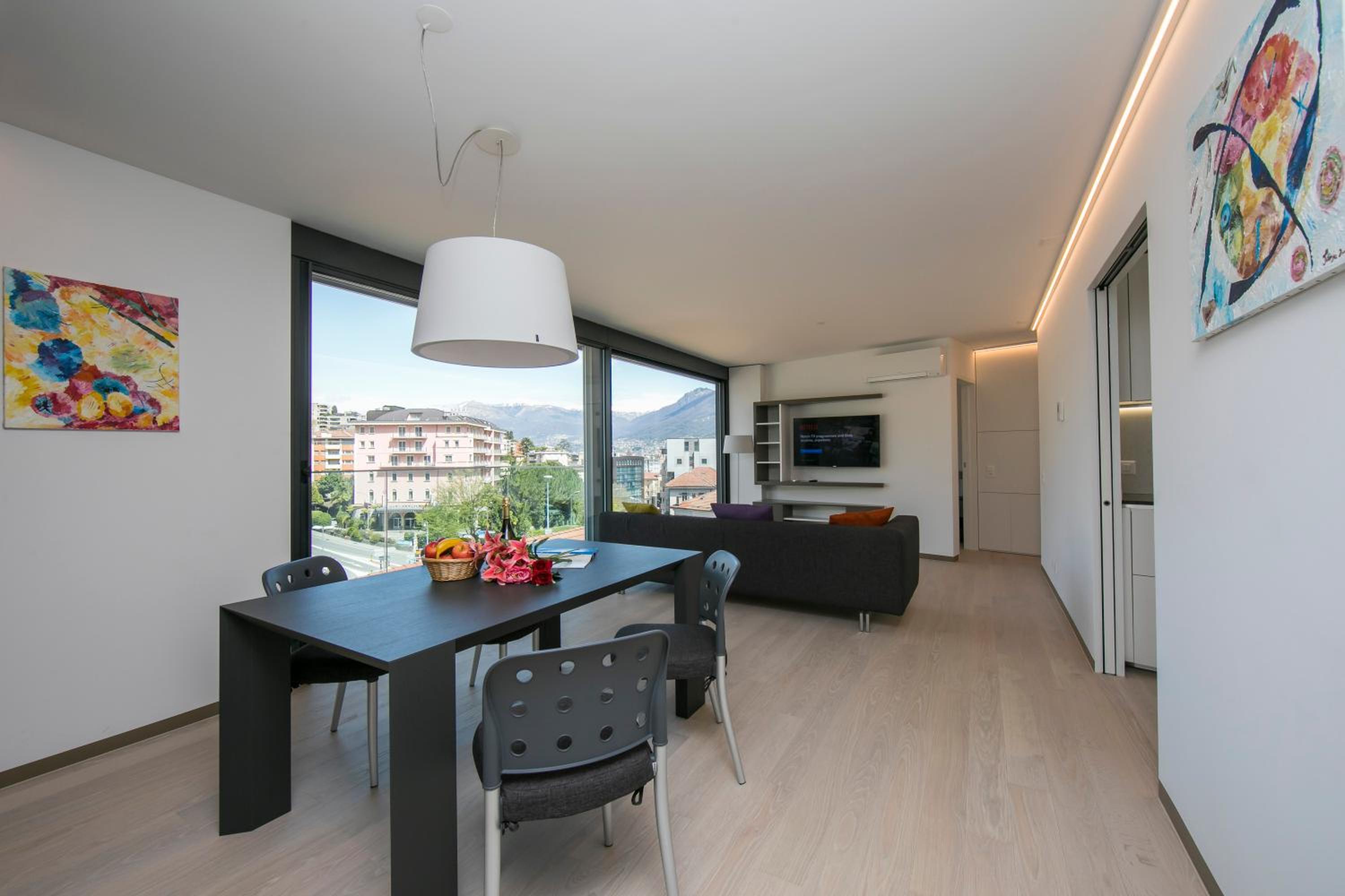 Urban Apartment Paradiso with Balcony and Parking - Happy Rentals