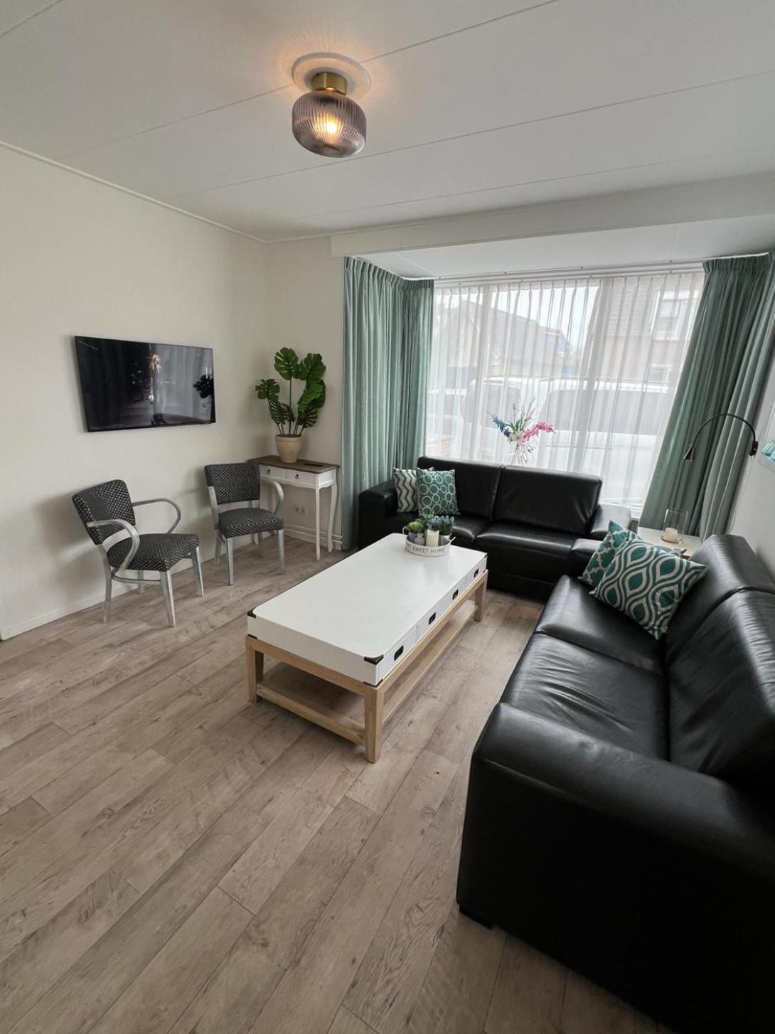 Modern spacious holiday home within walking distance of the North Sea beach in De Koog view 2