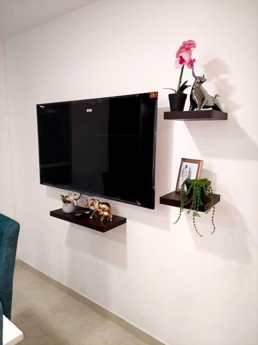 Apartamento en condominio con piscina