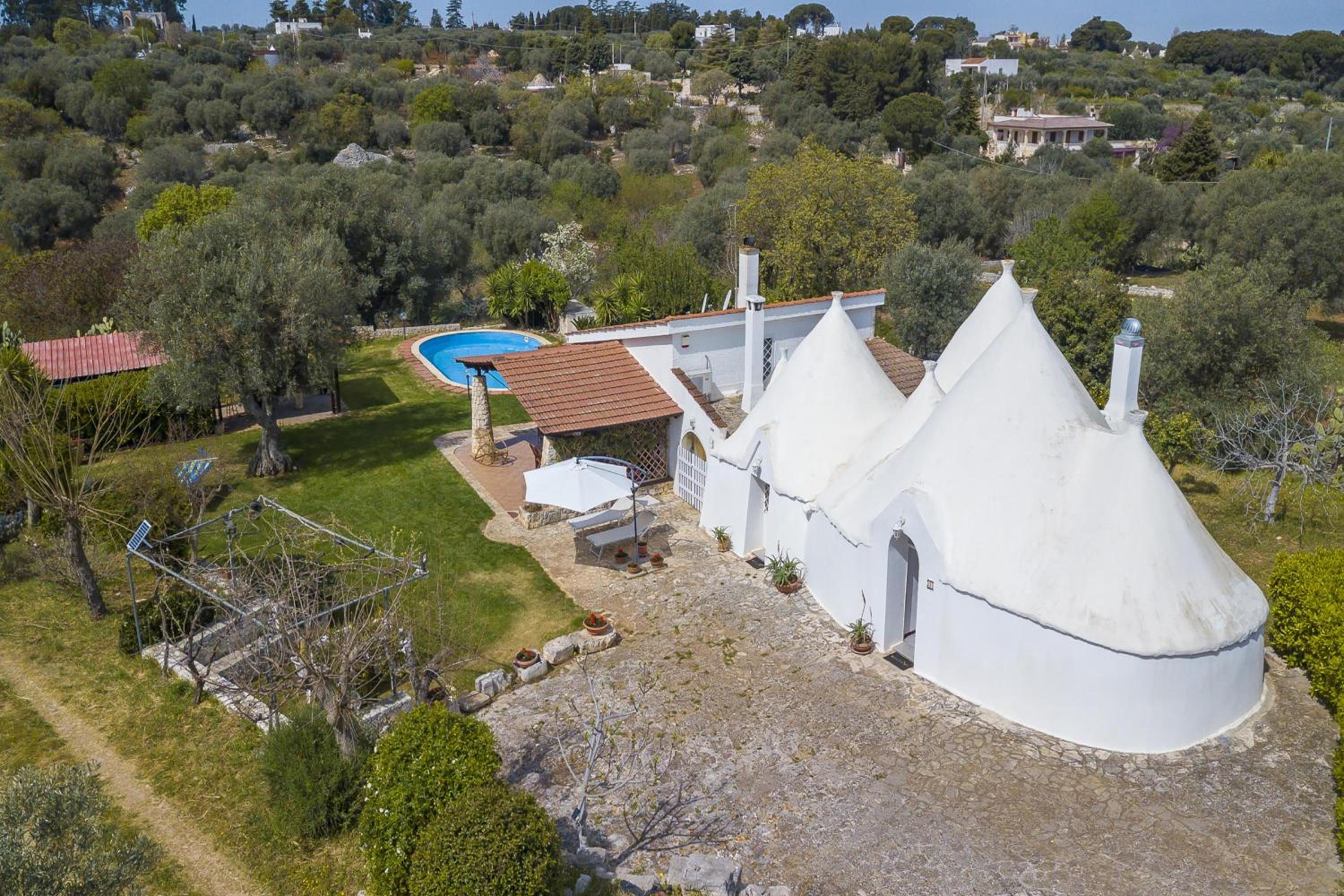 La Casa Sulla Roccia Trulli Pool - Happy Rentals en Monopoli