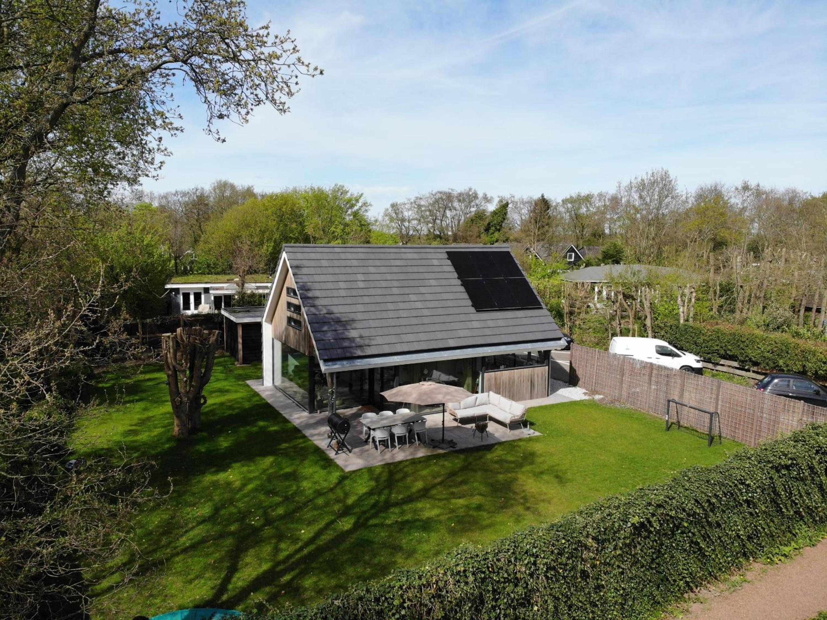 Mooie gezinsvriendelijke villa met ruime tuin! view 2