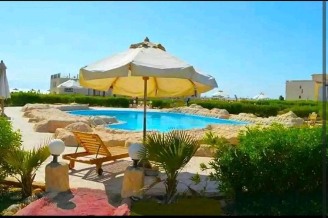 Beach and pools front challet in Ras Sudr