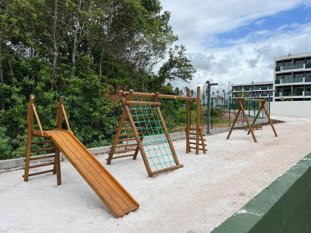 Resort em Porto de Galinhas- Flat Térreo Frente Piscinas- Muro Alto-B18