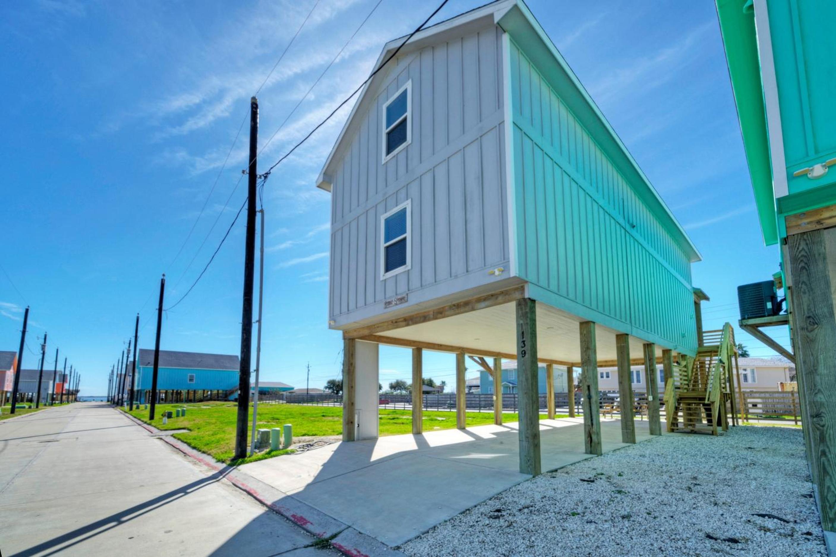 Sleeps 26 2 Homes w Waterfront Pool Boat Dock Laguna Village Escape
