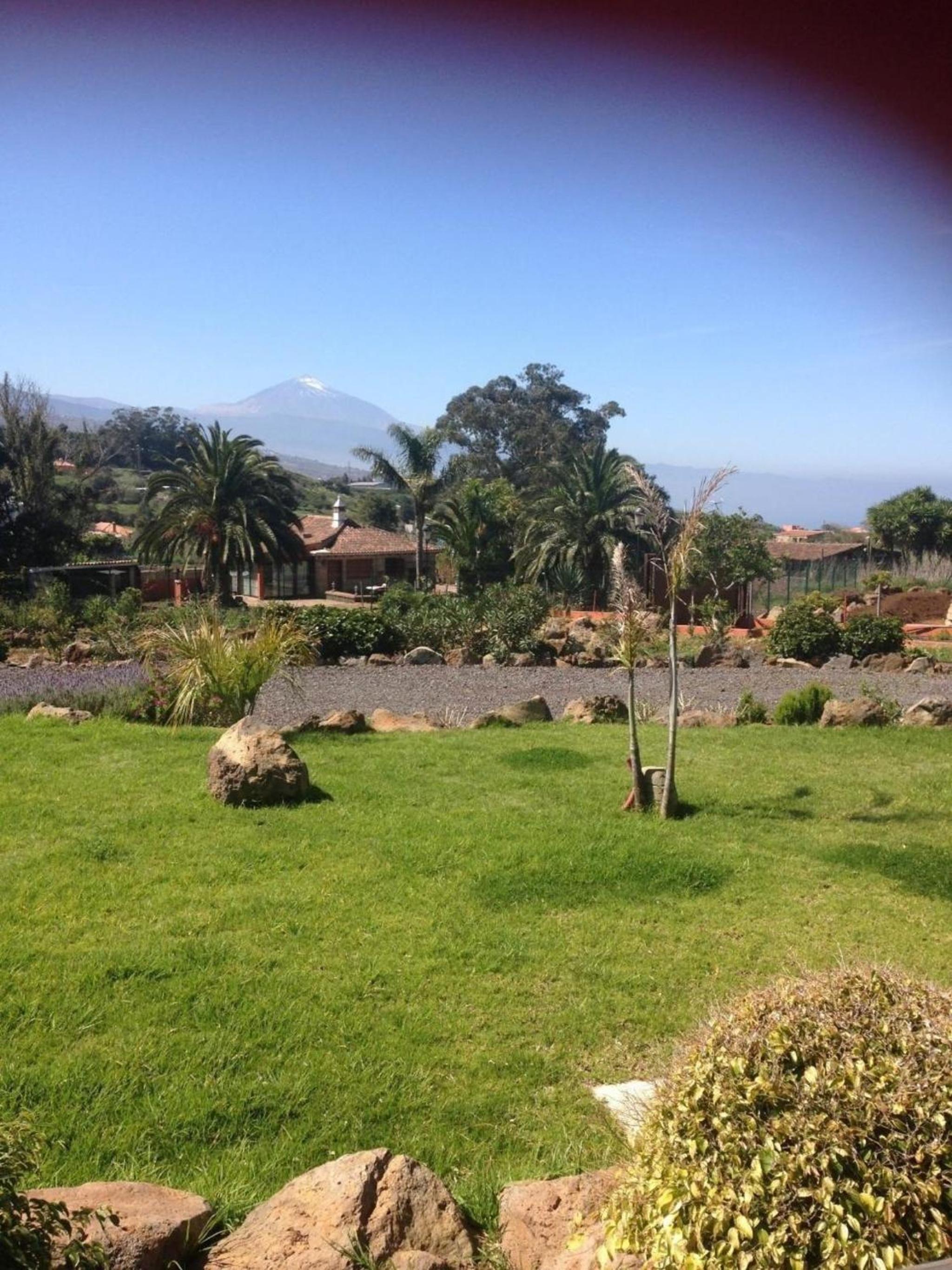 Ferienhaus in La Caridad mit Terrasse, Grill und Whirlpool