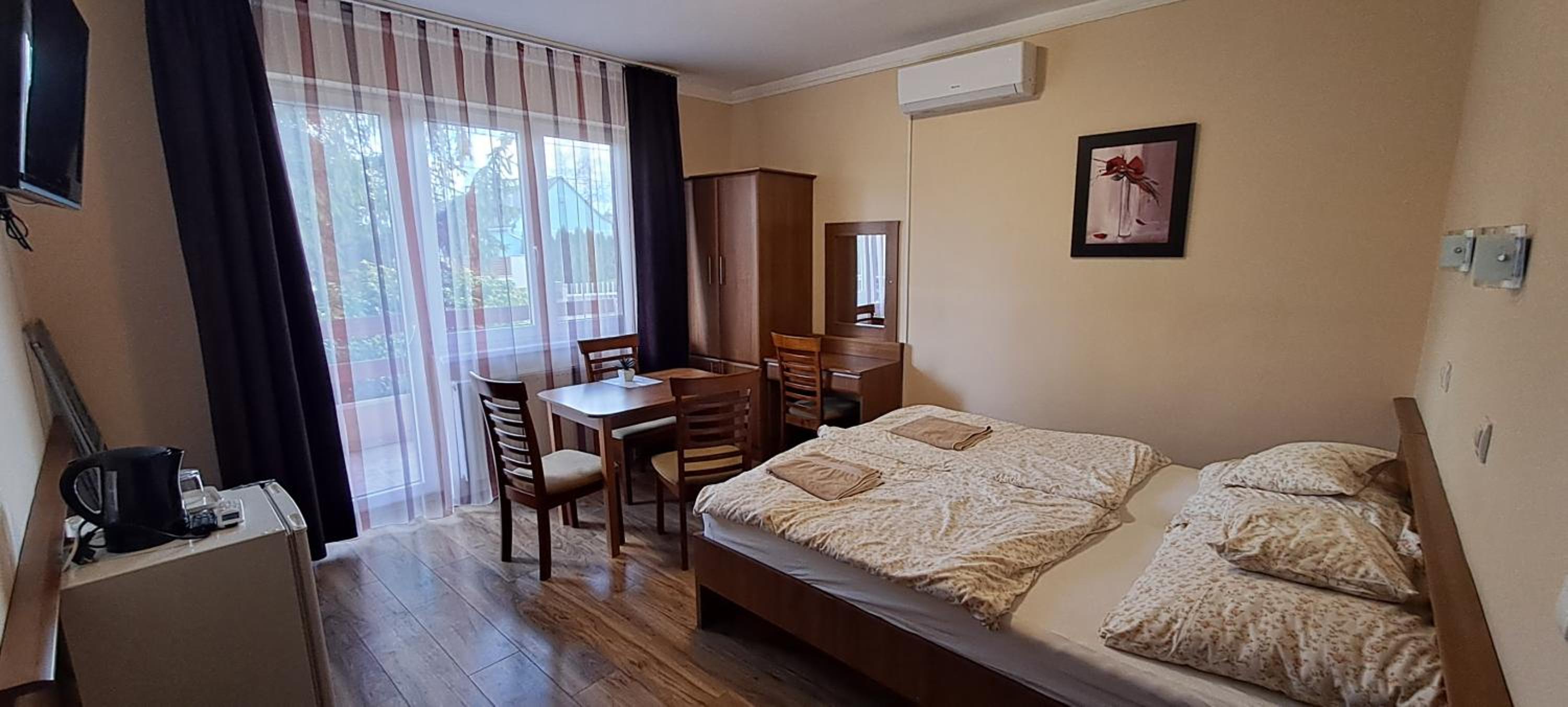 Andi Apartmanház