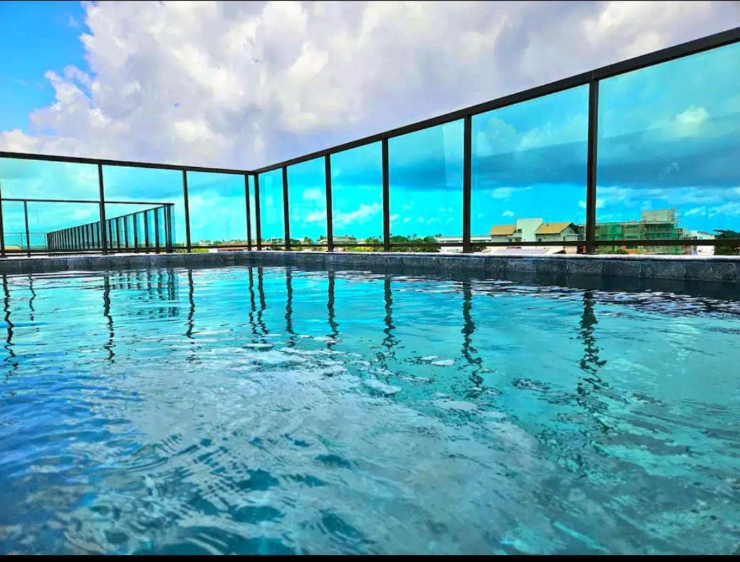 Studio luxo com piscina privativa e cascata no centro de porto de galinhas!