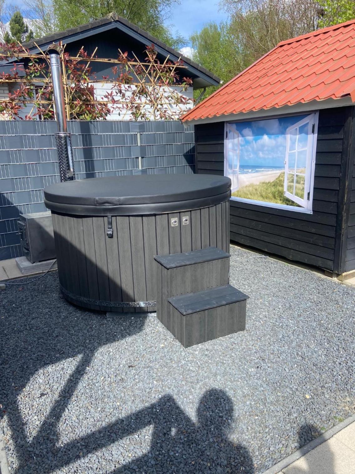 Wellness chalet Putten Hottub & Sauna in het bos view 4