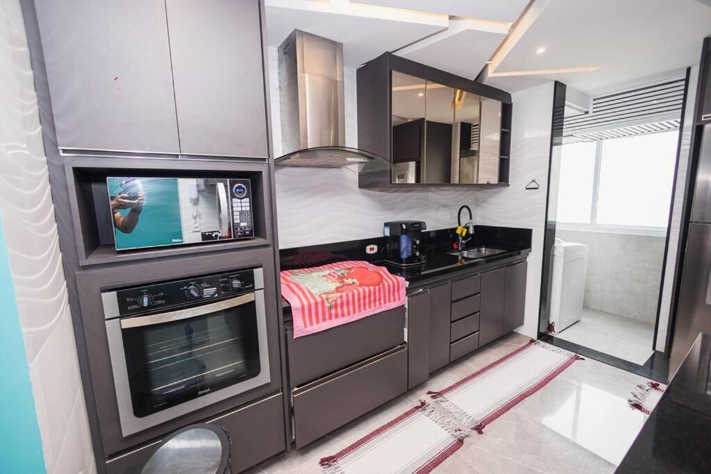 Apartamento pe na areia nas pitangueiras