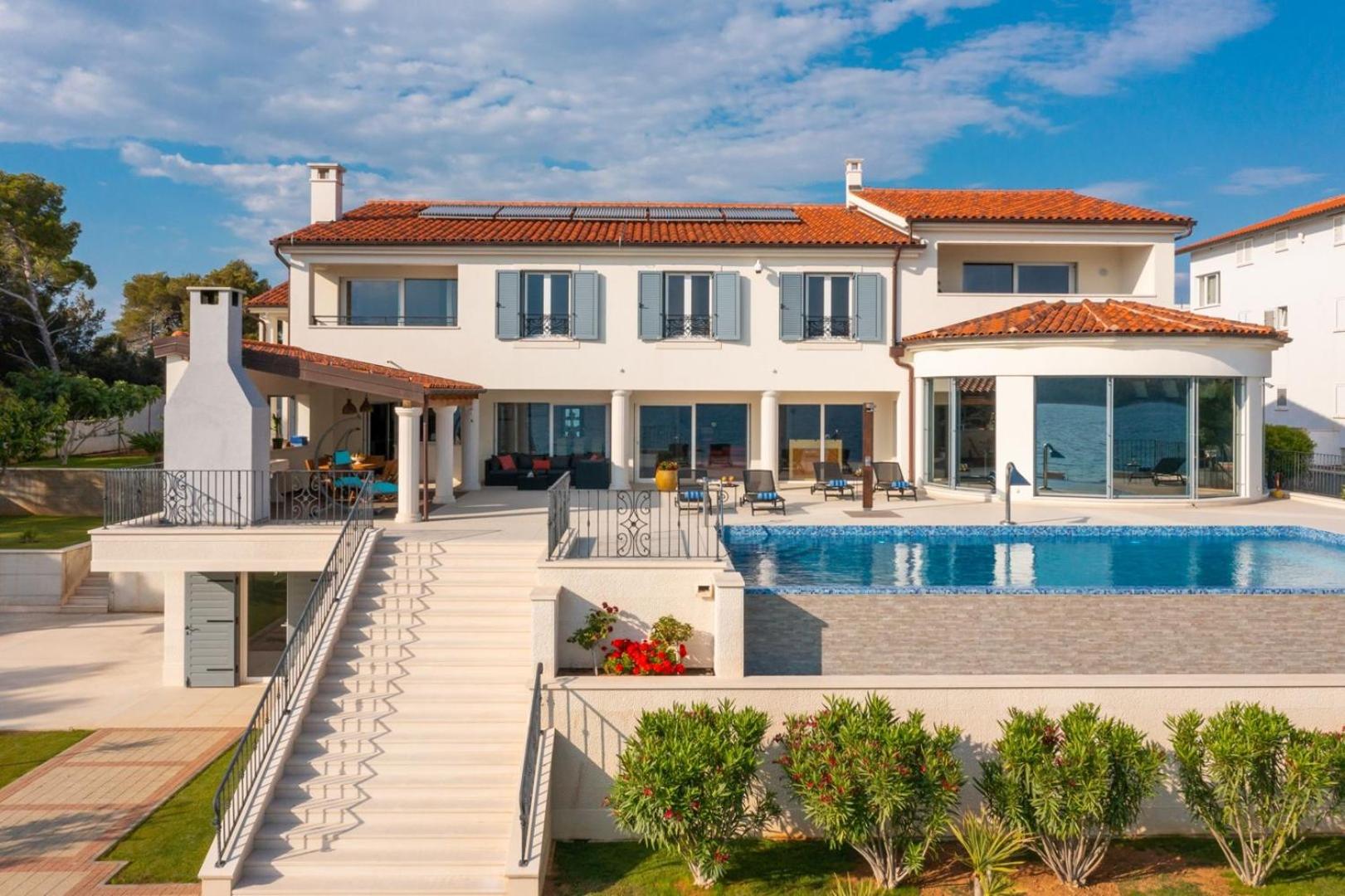 Luxury villa Sea Whisper steps from beach with indoor & outdoor pools near Šibenik view 2