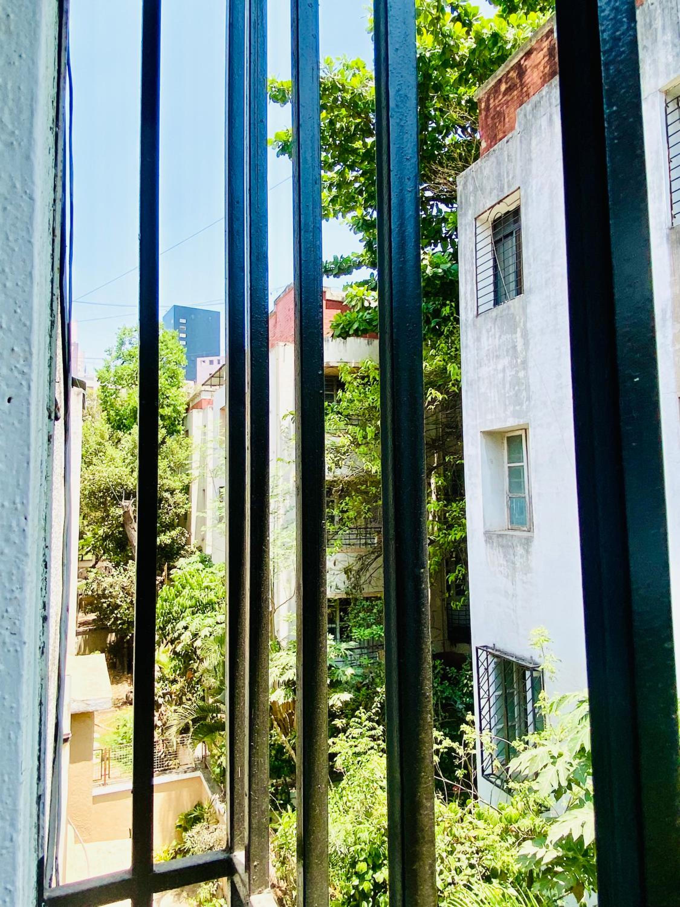 Budget Private Ac Room with Kitchen Near Osho Garden
