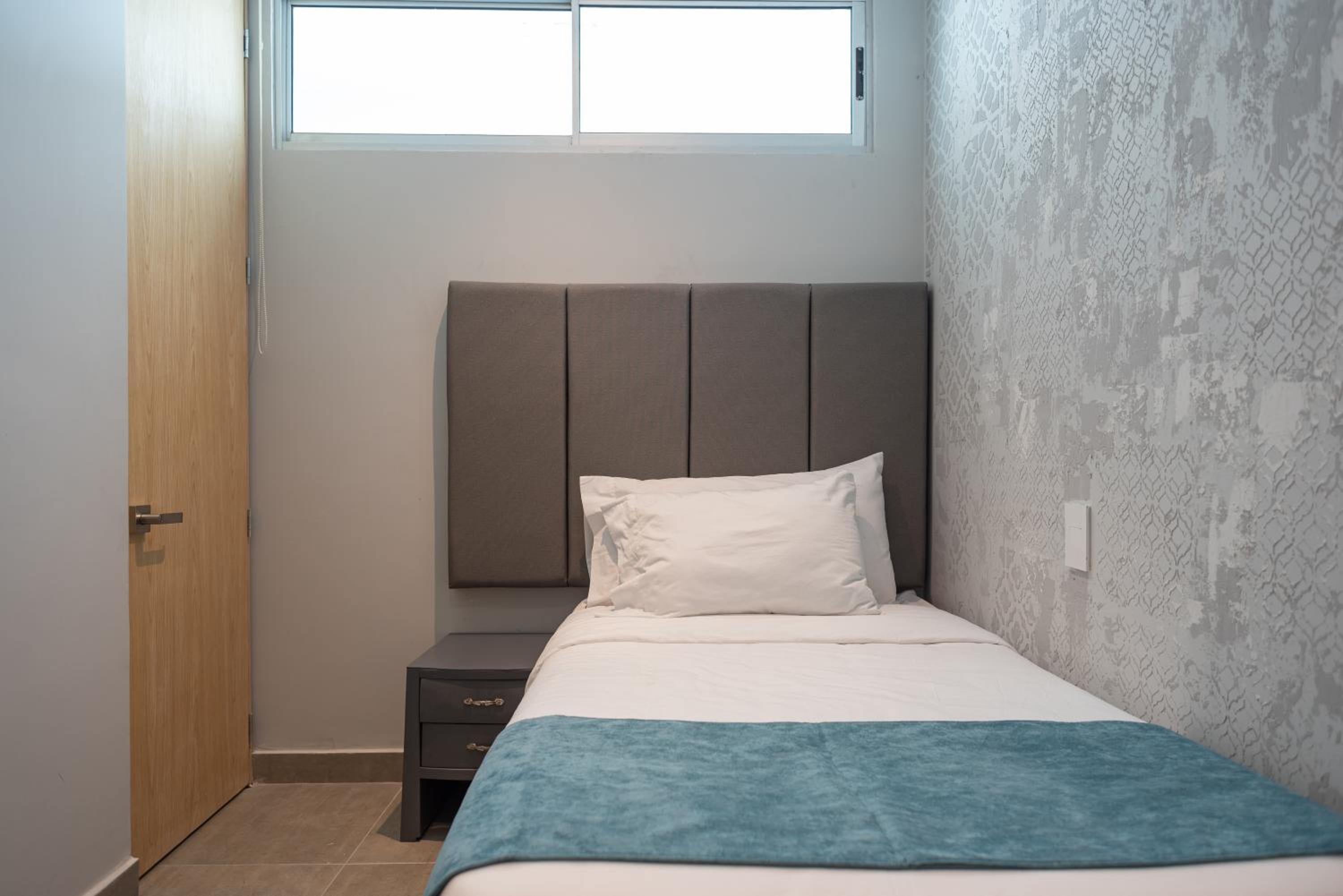 Tres habitaciones - Vista al Mar