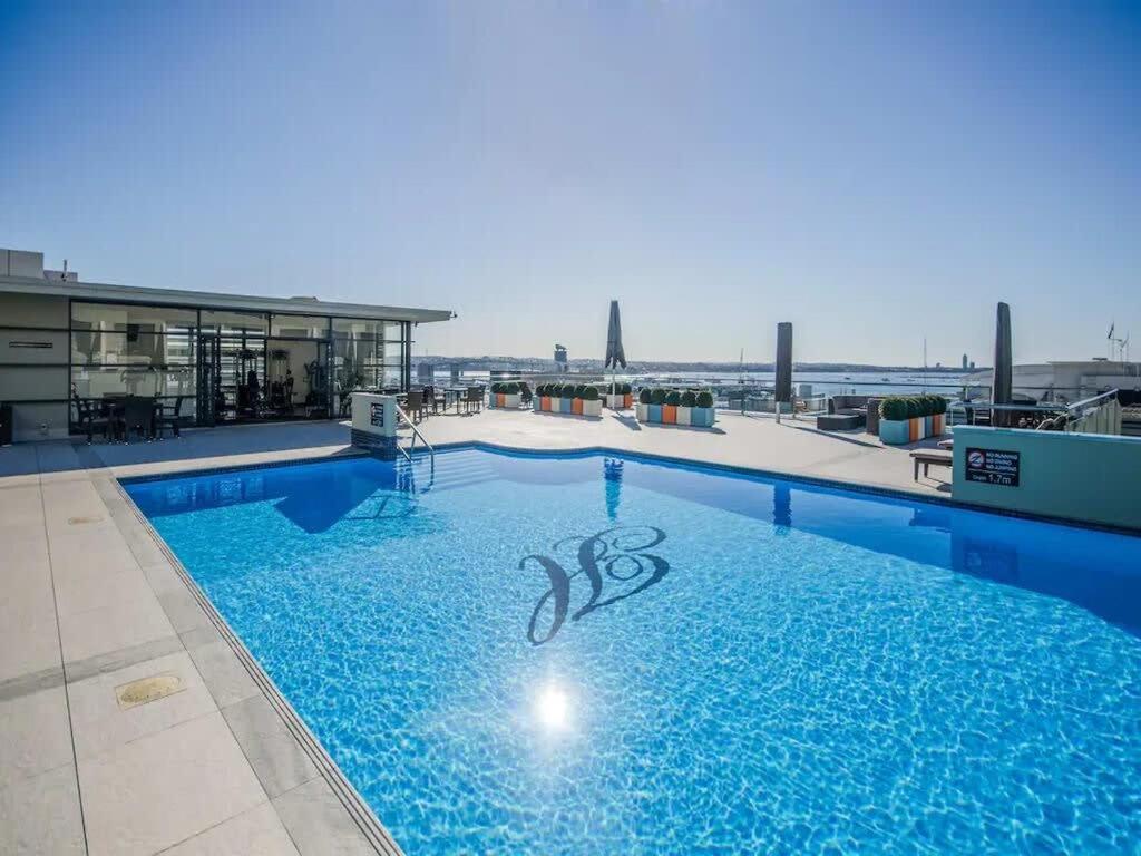 Spacious 1BR Apt Parking, Gym ,Pool by Zodiak Stays view 3