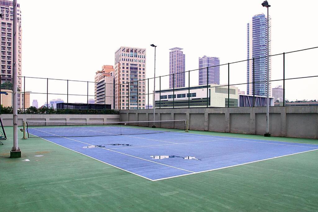Scandi style flat in Central Jakarta, Gym & Pool view 5