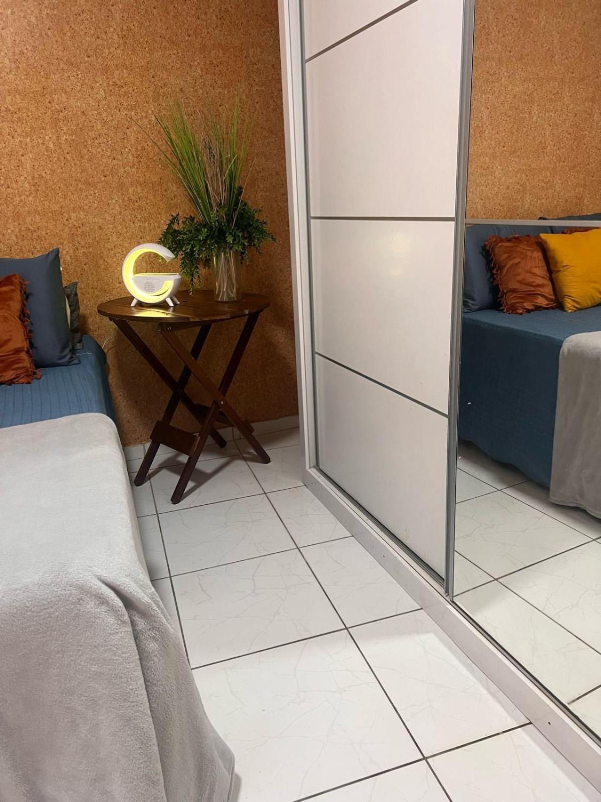Quarto em AP compartilhado Ponta da areia