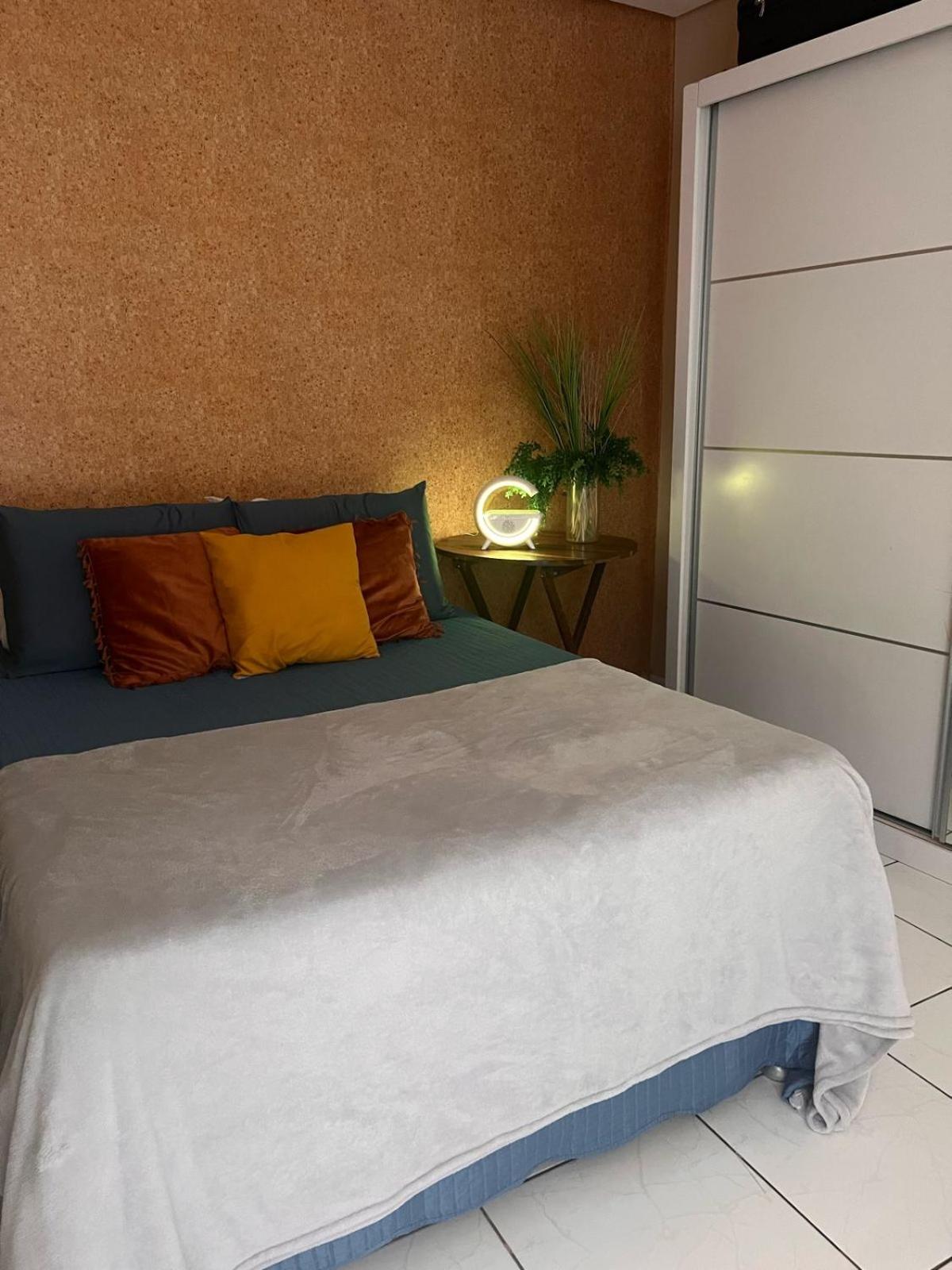 Quarto em AP compartilhado Ponta da areia
