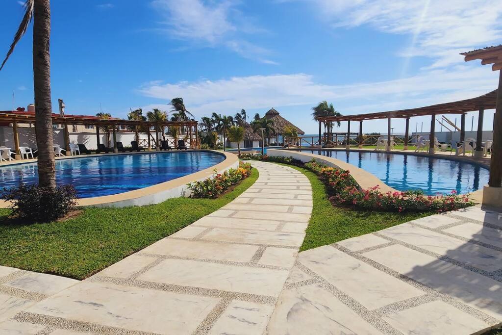 Increíble departamento Club de Playa canchas de pádel para 8 huéspedes