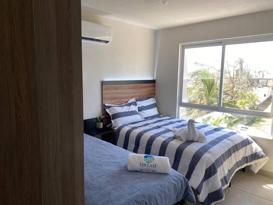 Increíble departamento Club de Playa canchas de pádel para 8 huéspedes
