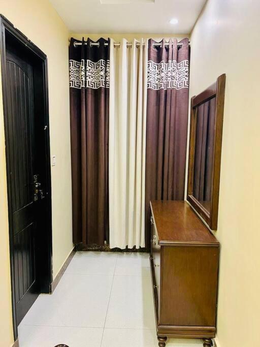 Bahria Town Lahore - NEXT INN Two Bedroom condo with free parking 203 view 3