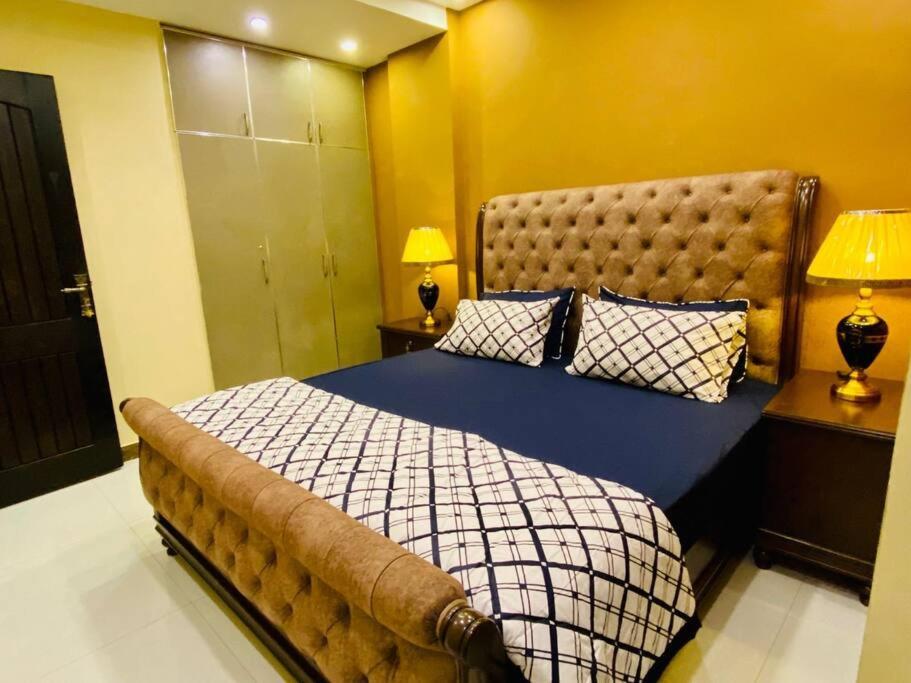 Bahria Town Lahore - NEXT INN Two Bedroom condo with free parking 203 view 4