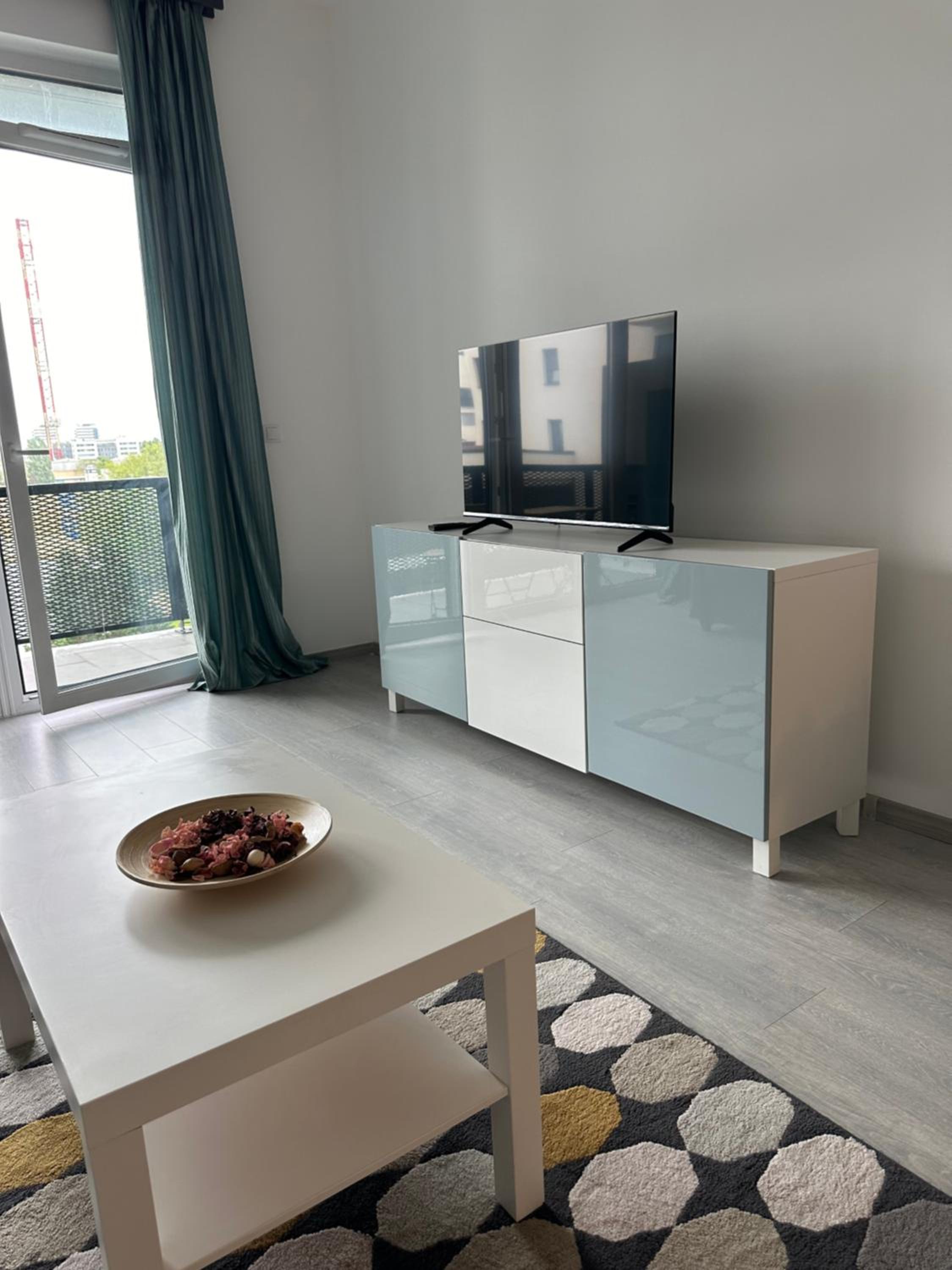 Modern Riverside Apartmen with a balcony and garage view 3