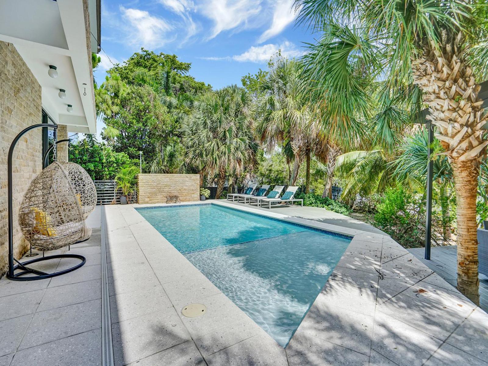 Experience Warmth & Comfort in our Stylish Balinese Waterfront Home