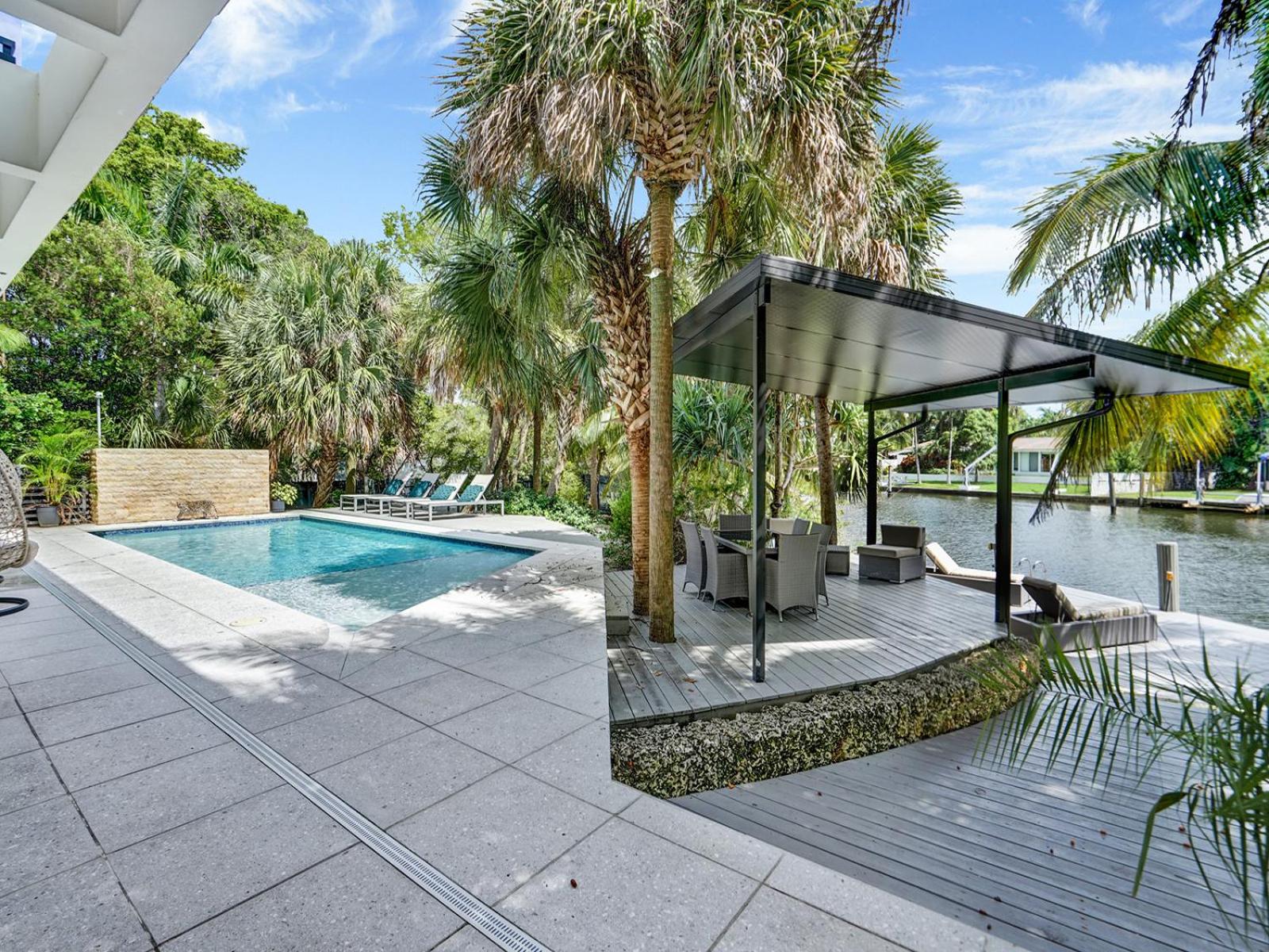 Experience Warmth & Comfort in our Stylish Balinese Waterfront Home