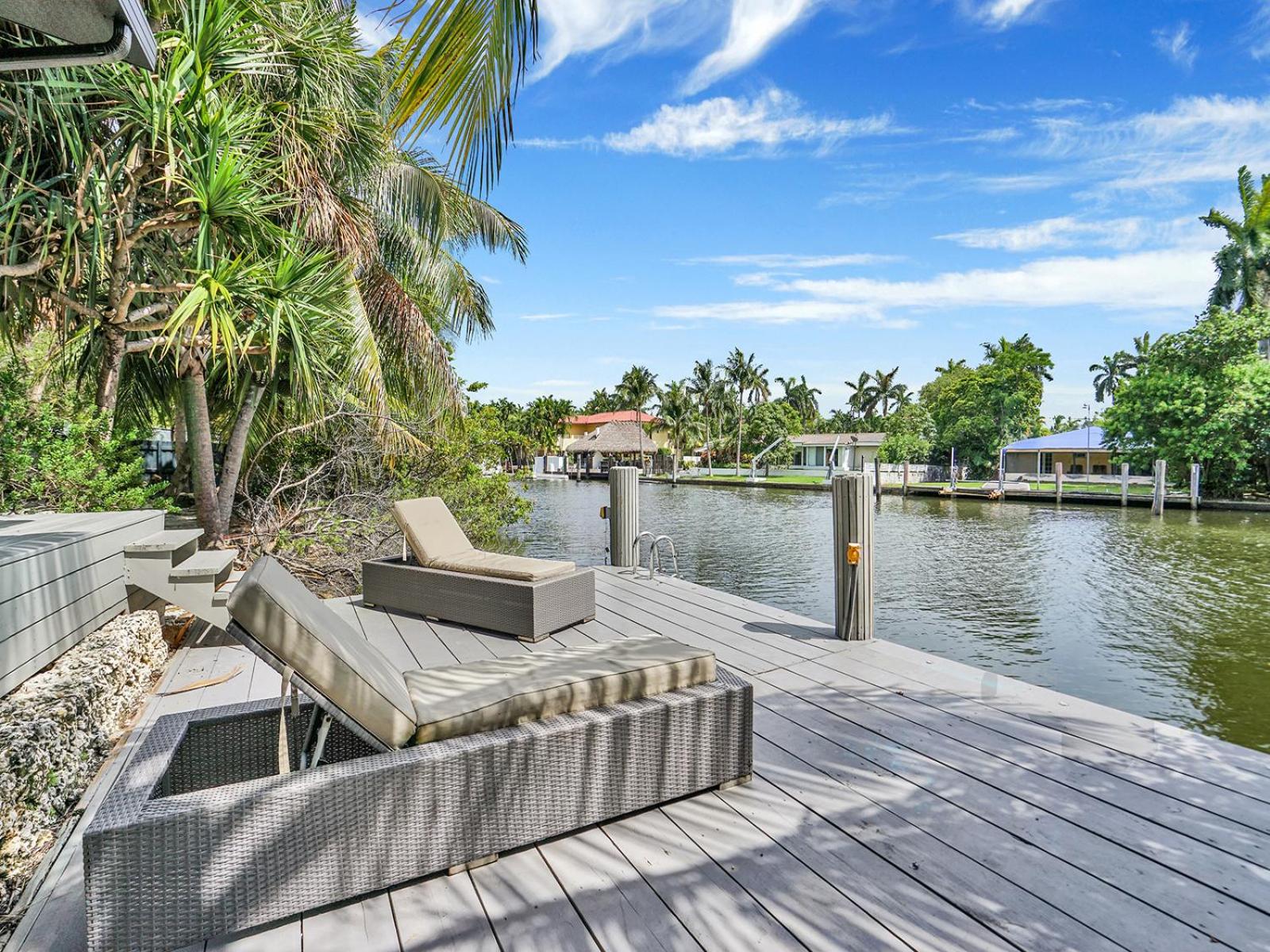 Experience Warmth & Comfort in our Stylish Balinese Waterfront Home