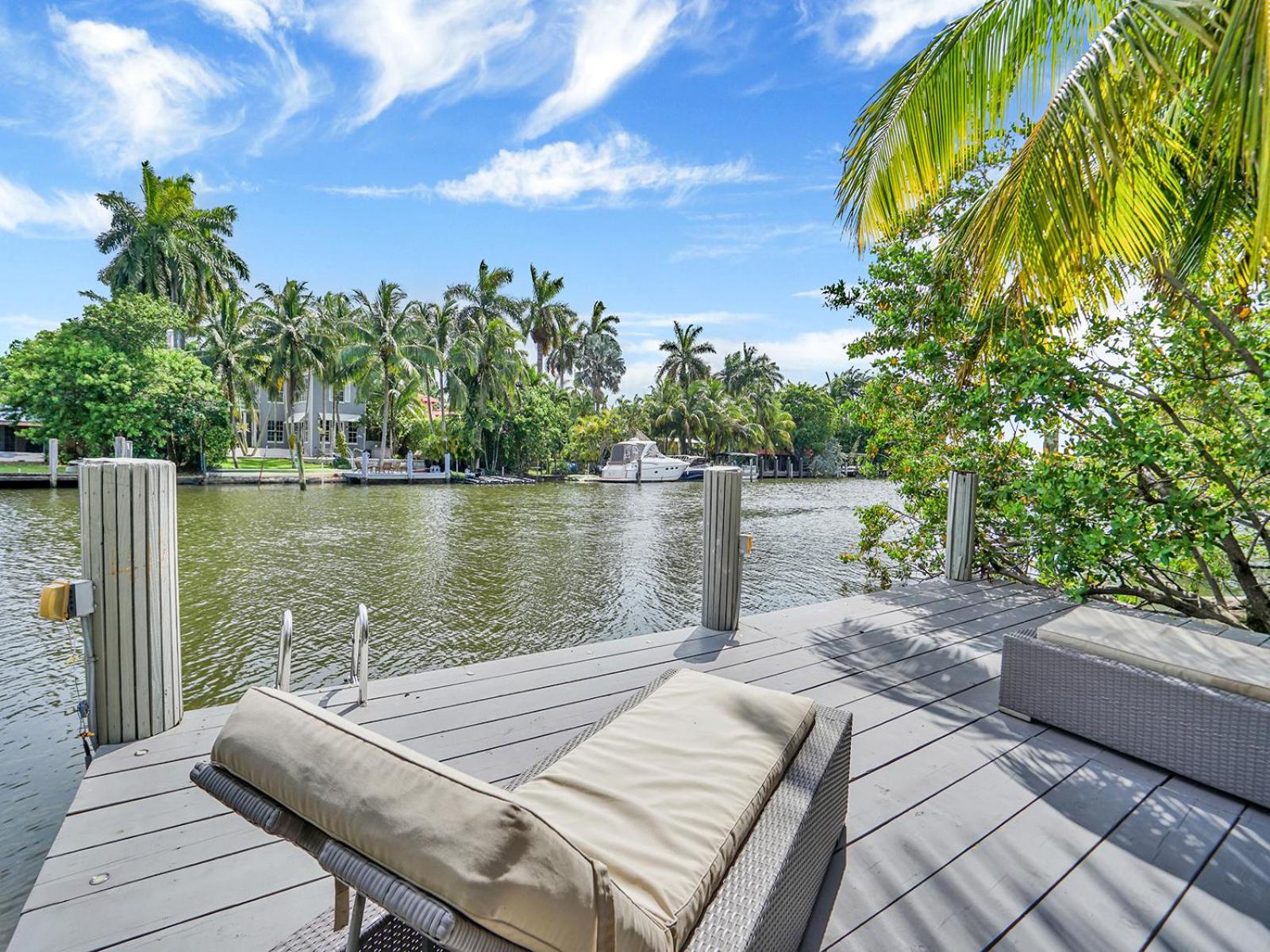 Experience Warmth & Comfort in our Stylish Balinese Waterfront Home
