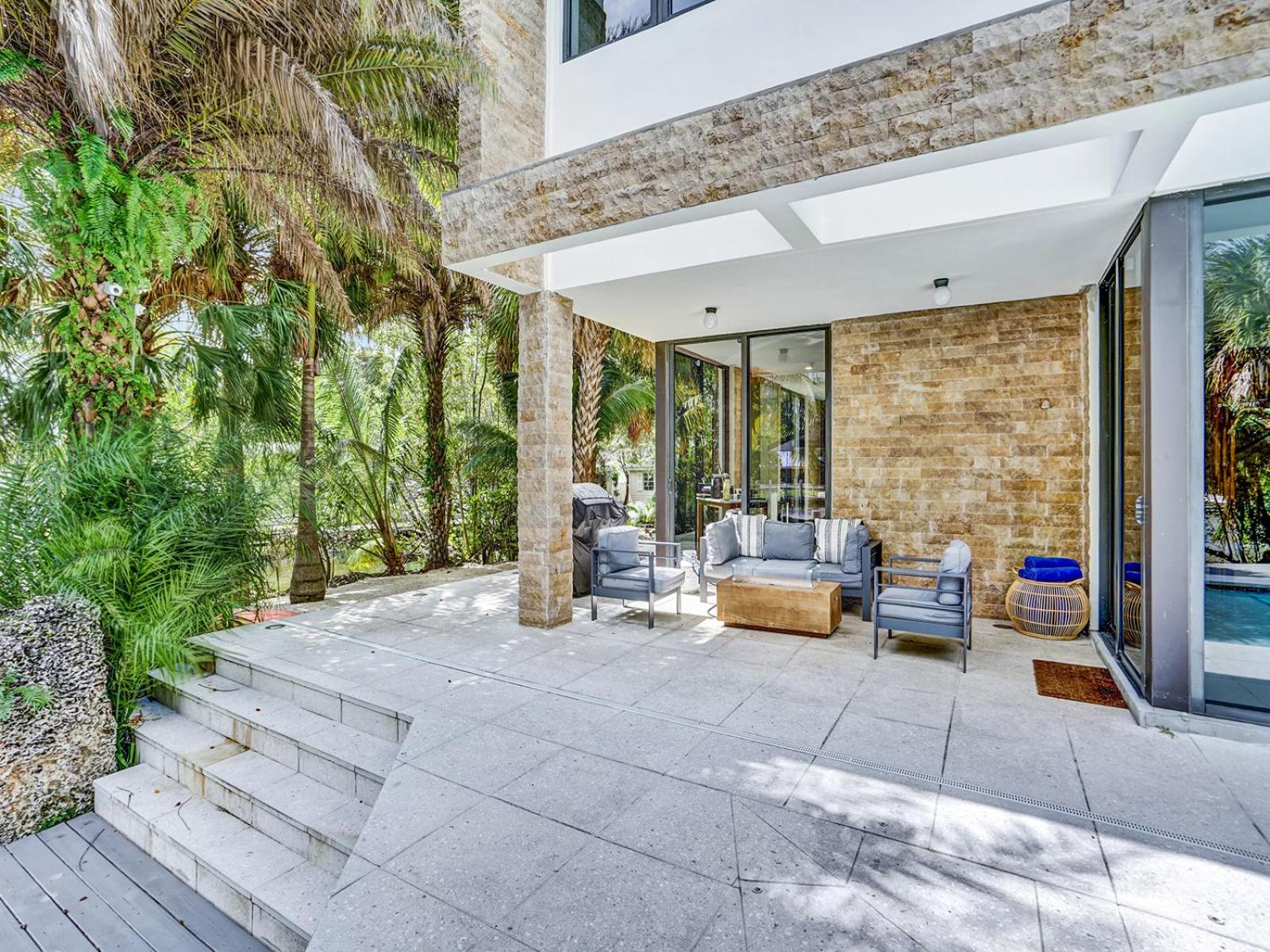 Experience Warmth & Comfort in our Stylish Balinese Waterfront Home