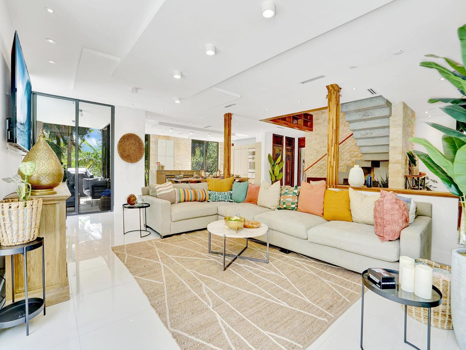 Experience Warmth & Comfort in our Stylish Balinese Waterfront Home