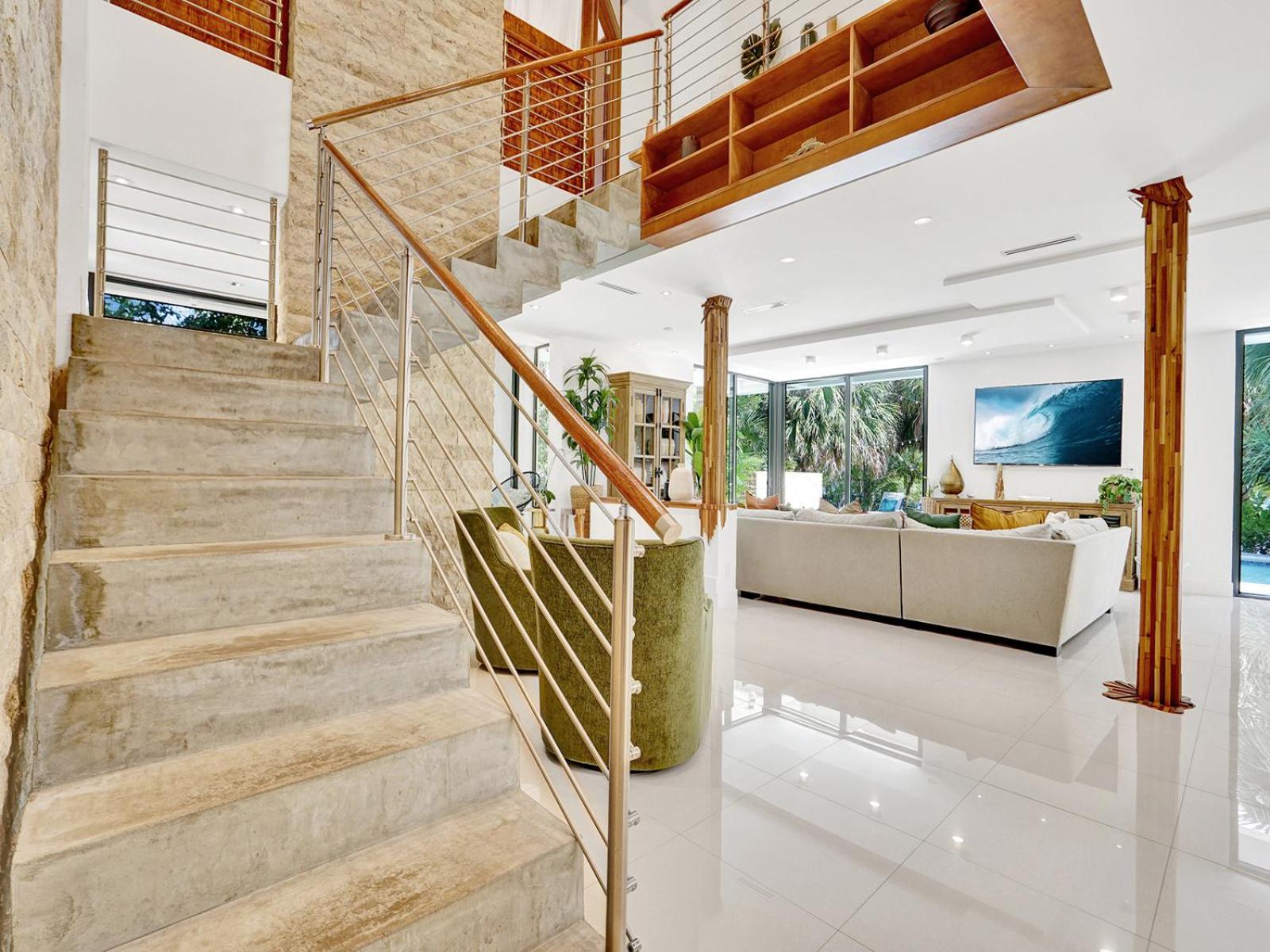 Experience Warmth & Comfort in our Stylish Balinese Waterfront Home