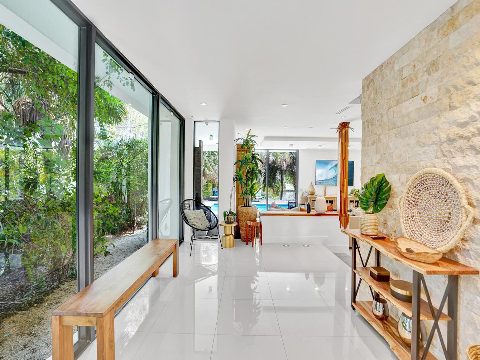 Experience Warmth & Comfort in our Stylish Balinese Waterfront Home