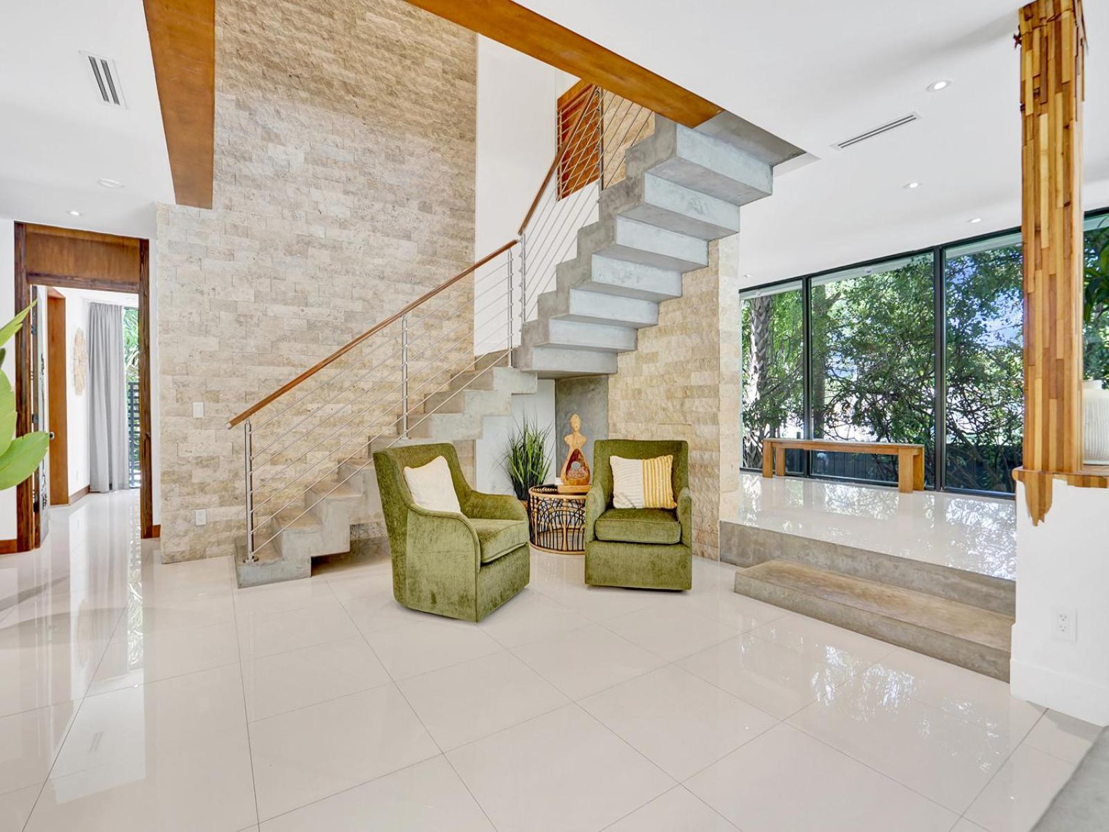 Experience Warmth & Comfort in our Stylish Balinese Waterfront Home