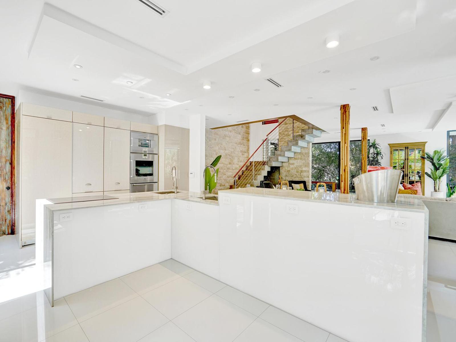 Experience Warmth & Comfort in our Stylish Balinese Waterfront Home