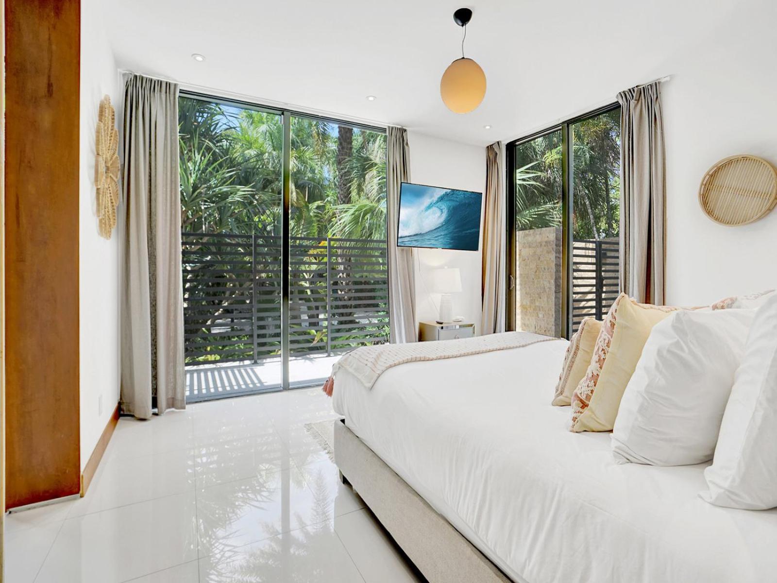 Experience Warmth & Comfort in our Stylish Balinese Waterfront Home