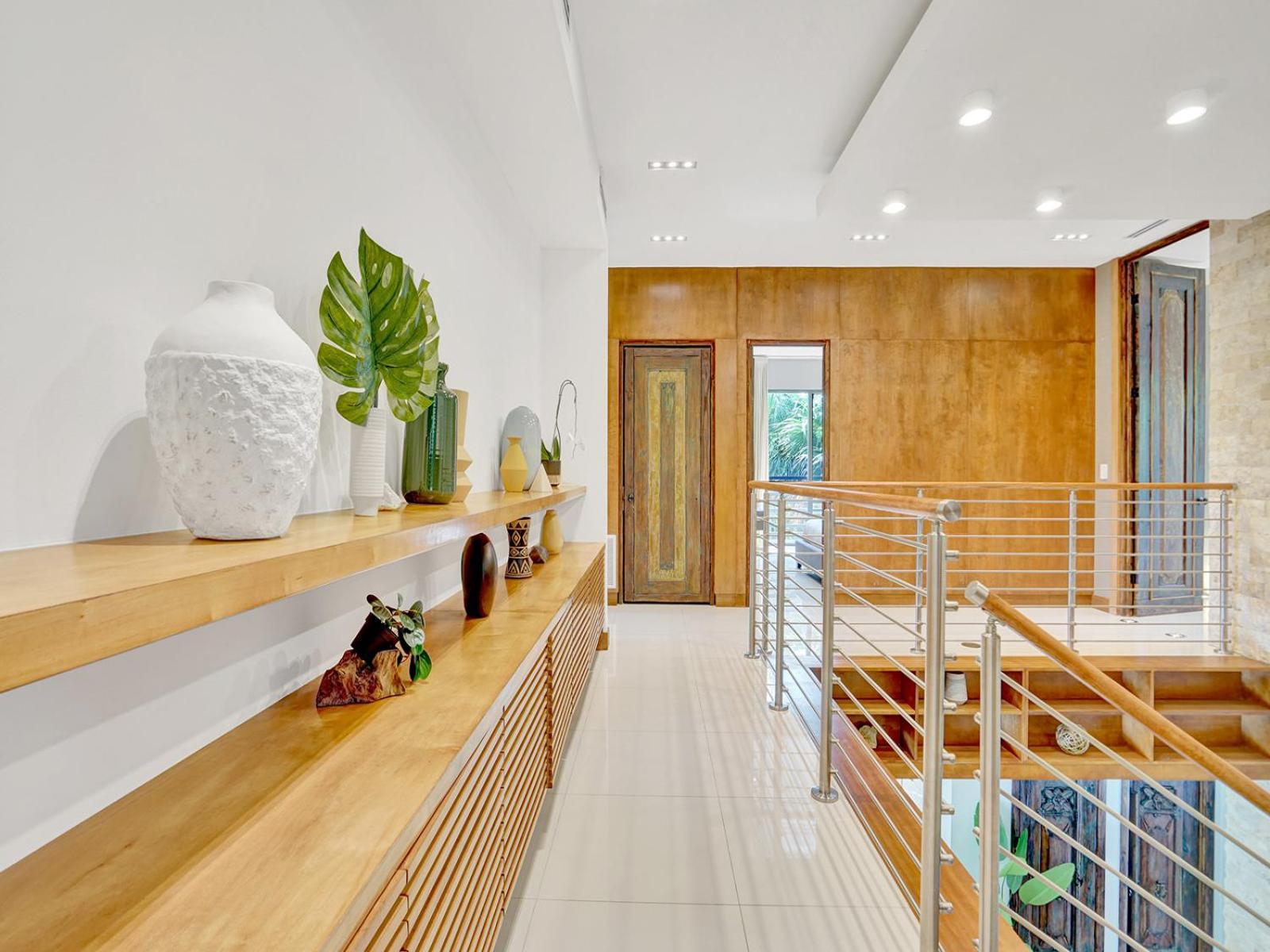 Experience Warmth & Comfort in our Stylish Balinese Waterfront Home