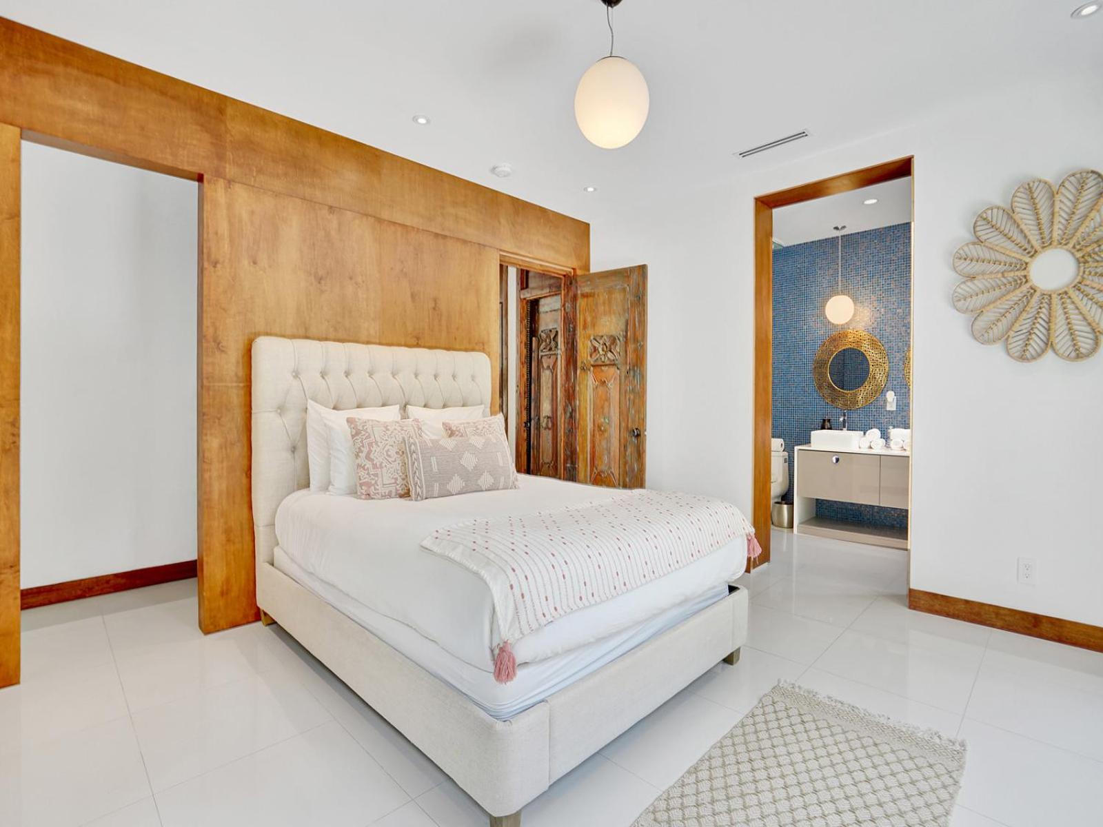 Experience Warmth & Comfort in our Stylish Balinese Waterfront Home