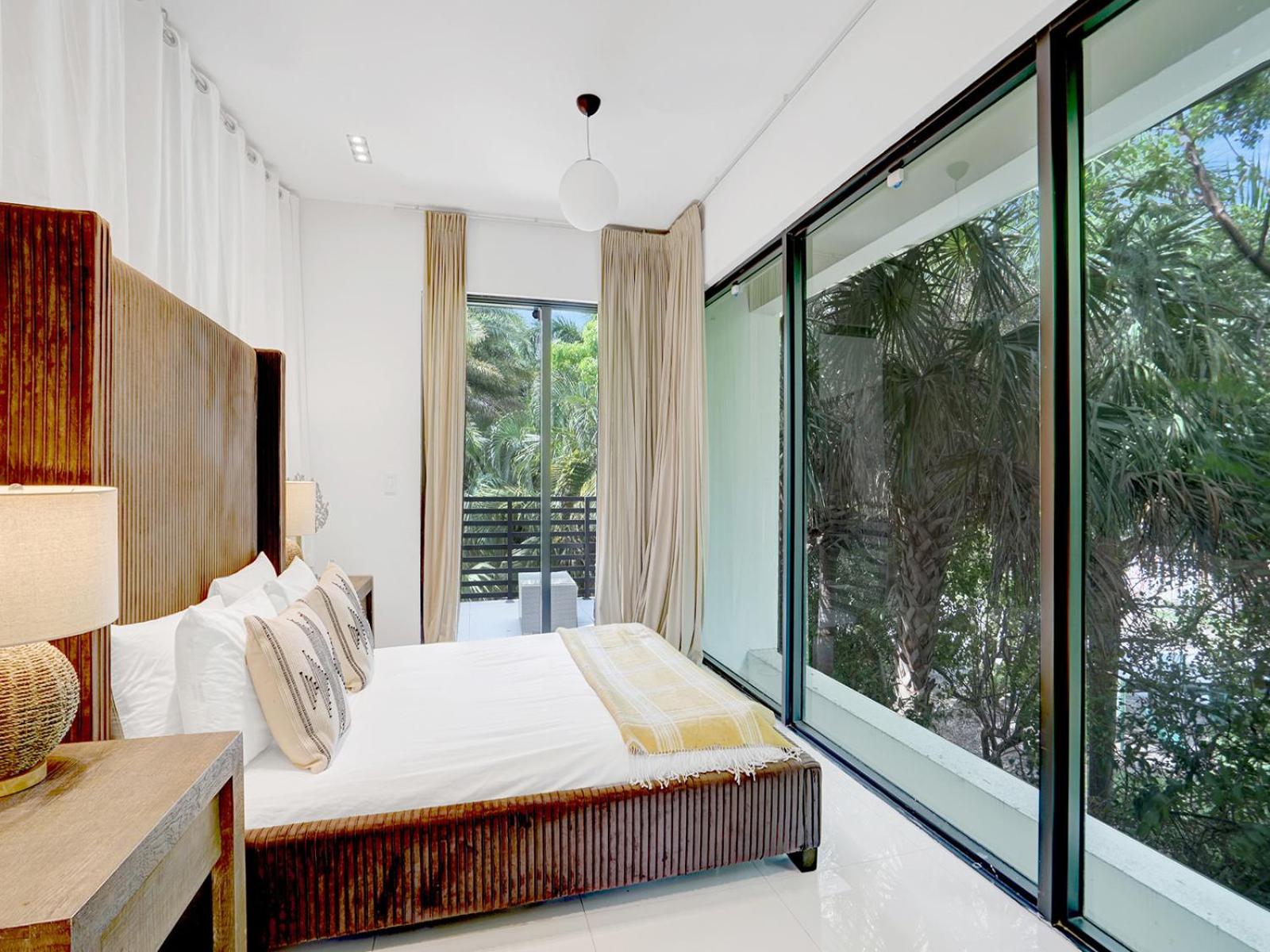 Experience Warmth & Comfort in our Stylish Balinese Waterfront Home