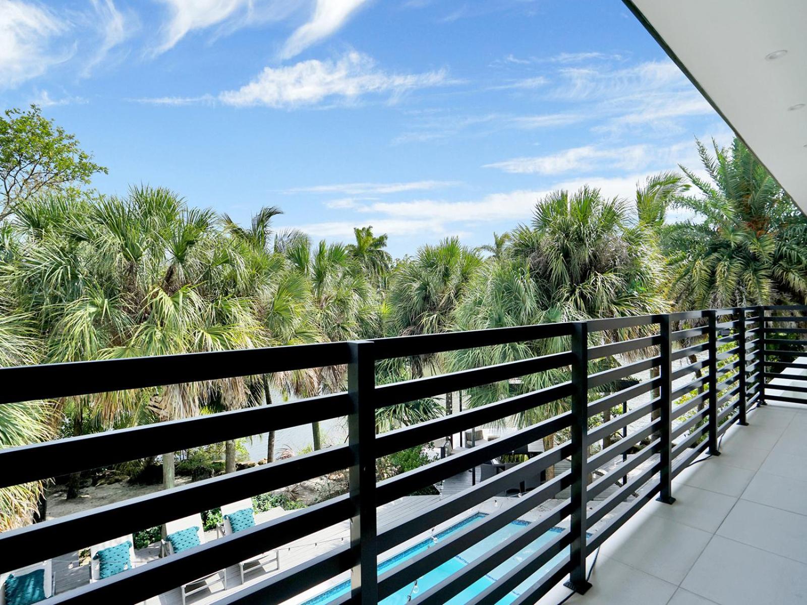 Experience Warmth & Comfort in our Stylish Balinese Waterfront Home