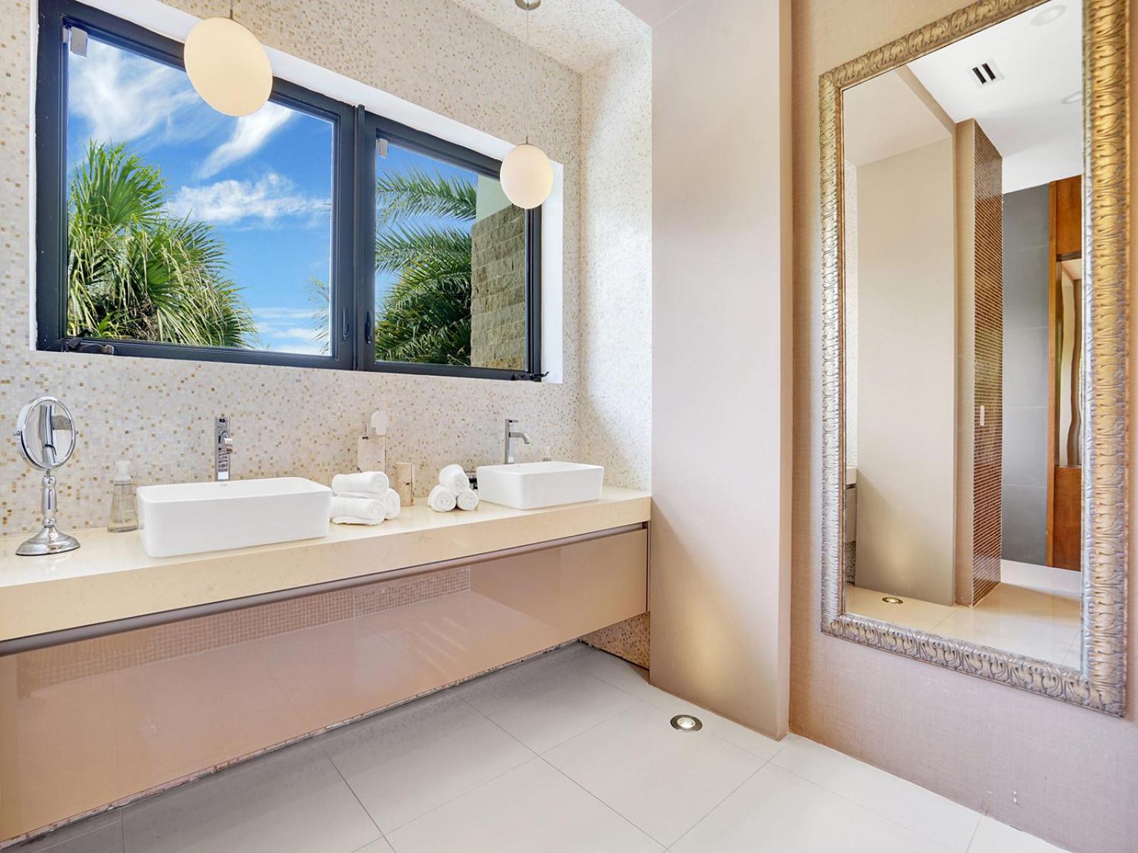 Experience Warmth & Comfort in our Stylish Balinese Waterfront Home