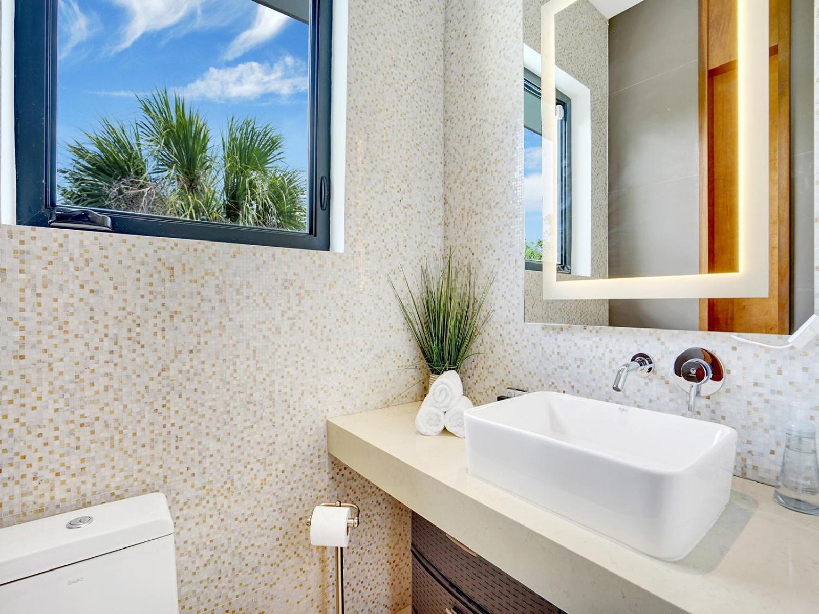 Experience Warmth & Comfort in our Stylish Balinese Waterfront Home