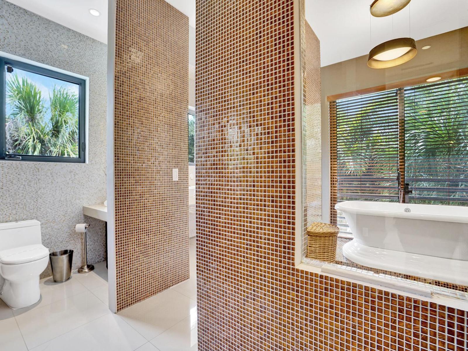 Experience Warmth & Comfort in our Stylish Balinese Waterfront Home