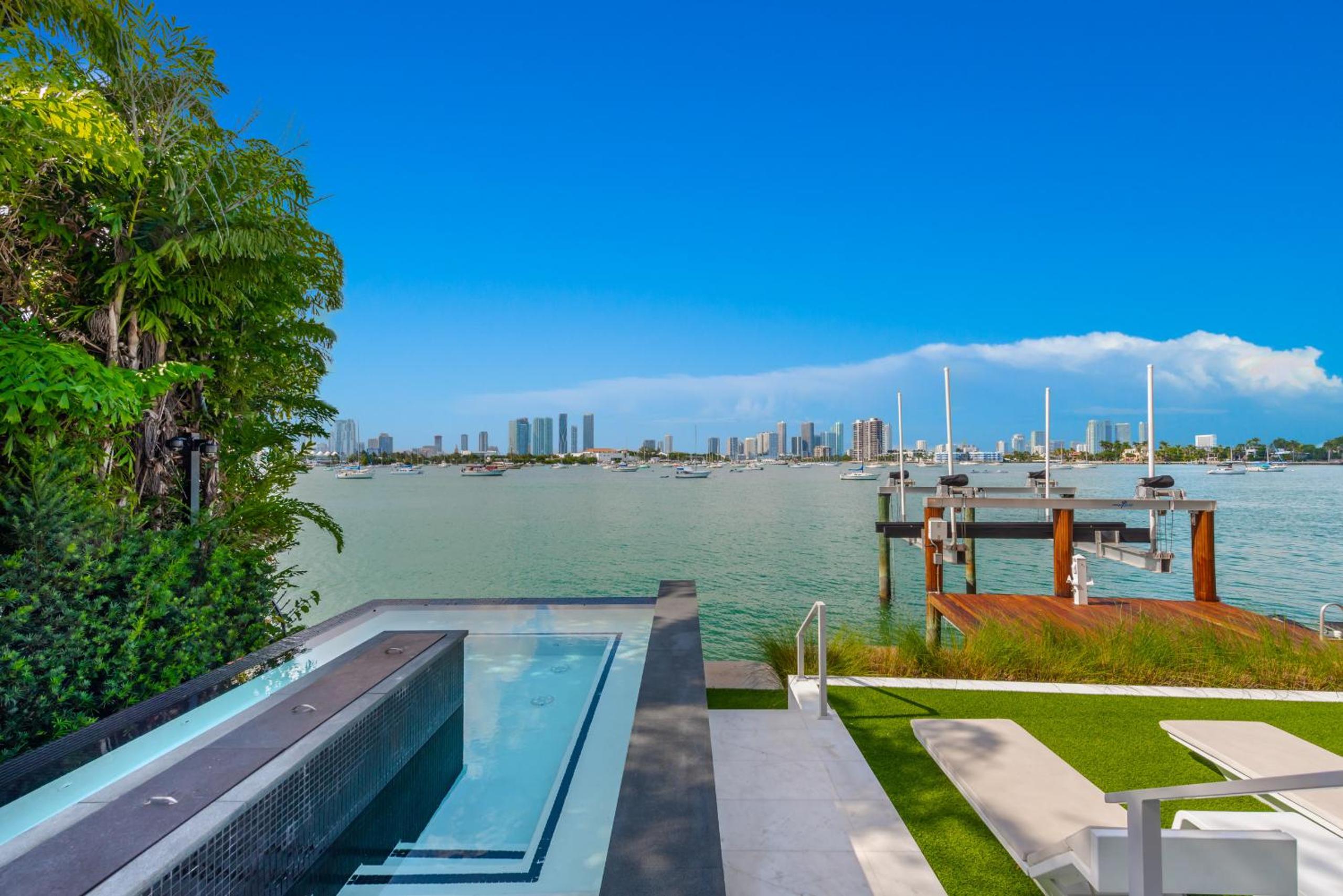Indulge in Waterfront Elegance Your Ultra Luxury Miami Beach Estate Beckons!