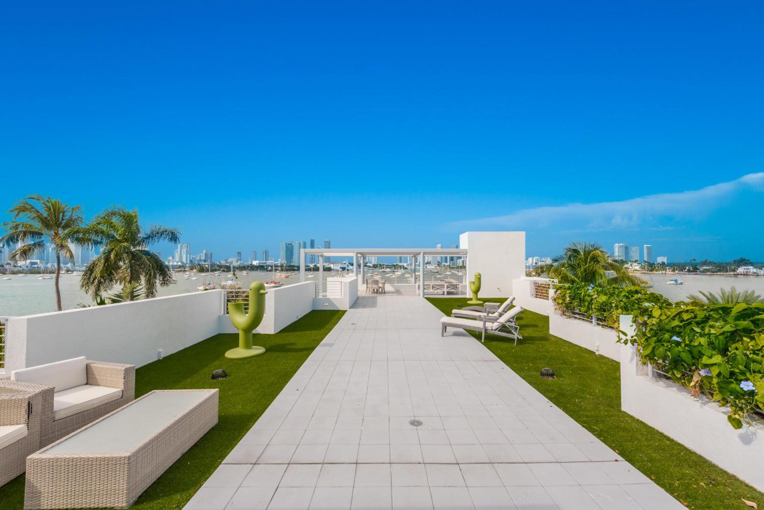Indulge in Waterfront Elegance Your Ultra Luxury Miami Beach Estate Beckons!