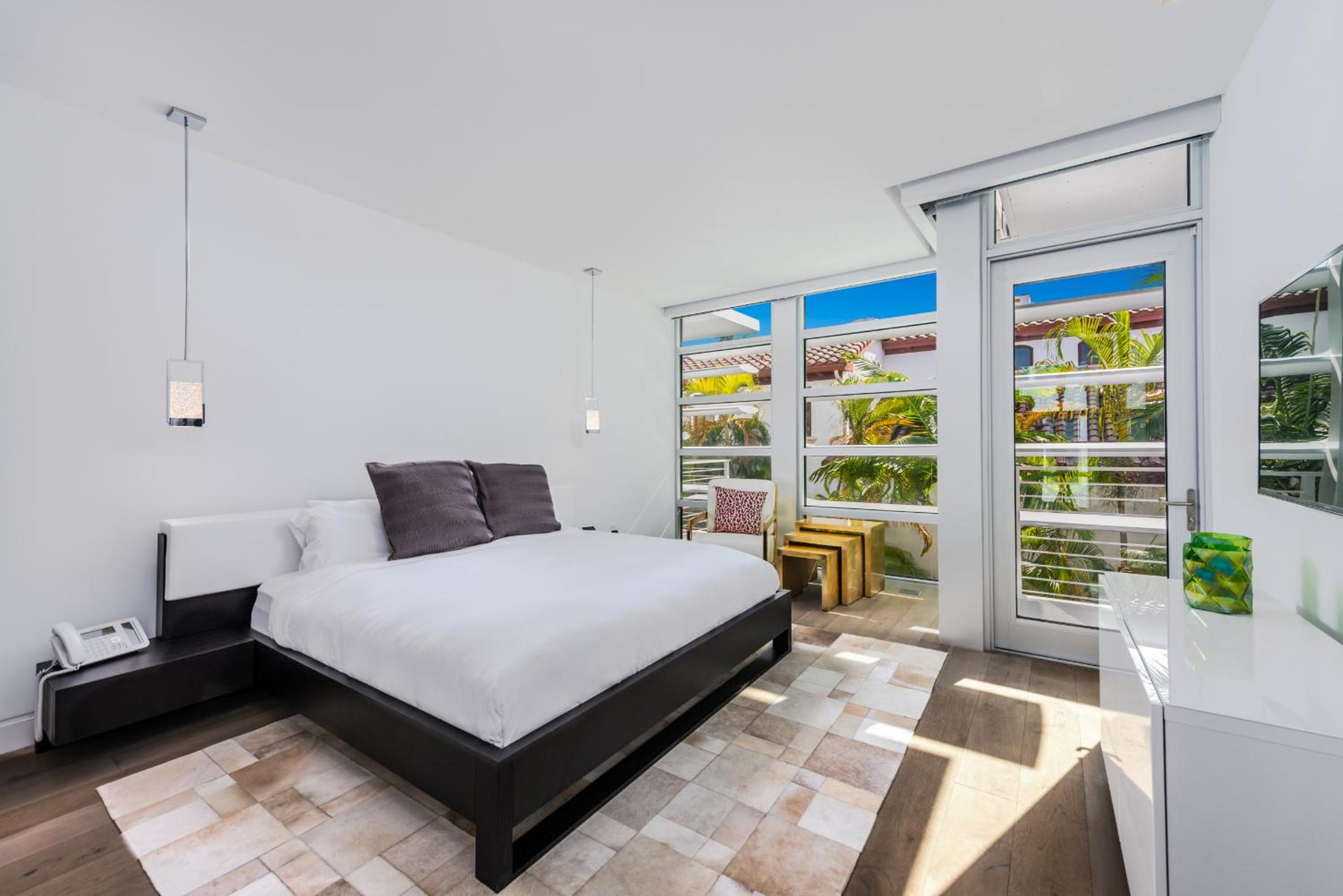 Indulge in Waterfront Elegance Your Ultra Luxury Miami Beach Estate Beckons!